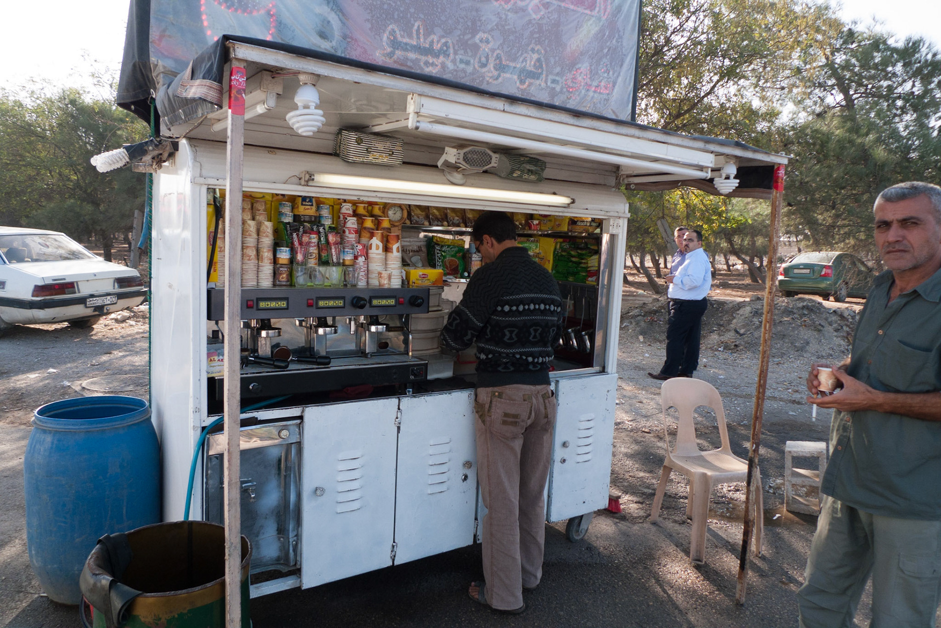 On the Road to Rasafieh, Coffee Stop (Nasser our driver on the right)