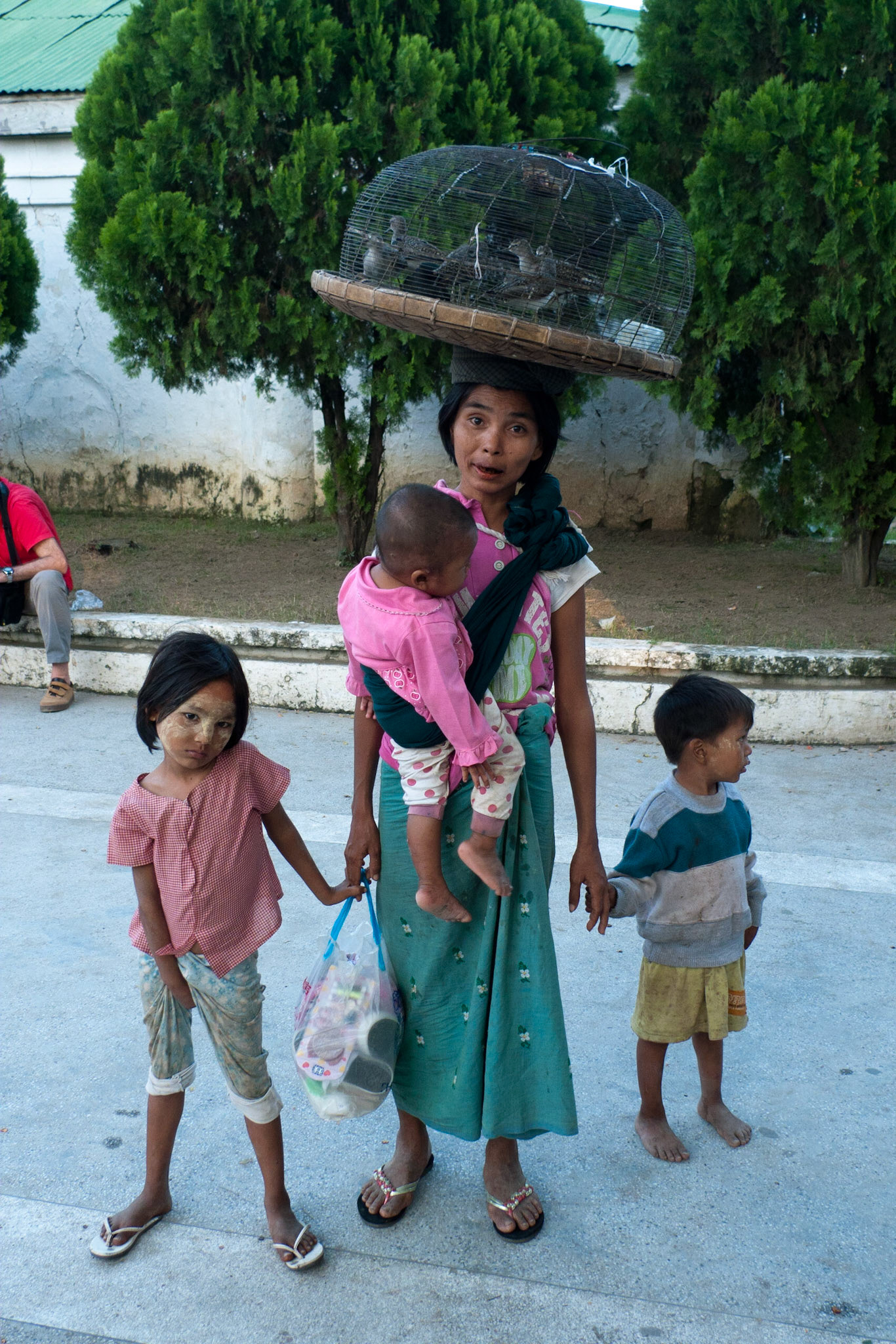 Mandalay:  Selling (homing?) sparrows to be released as offerings