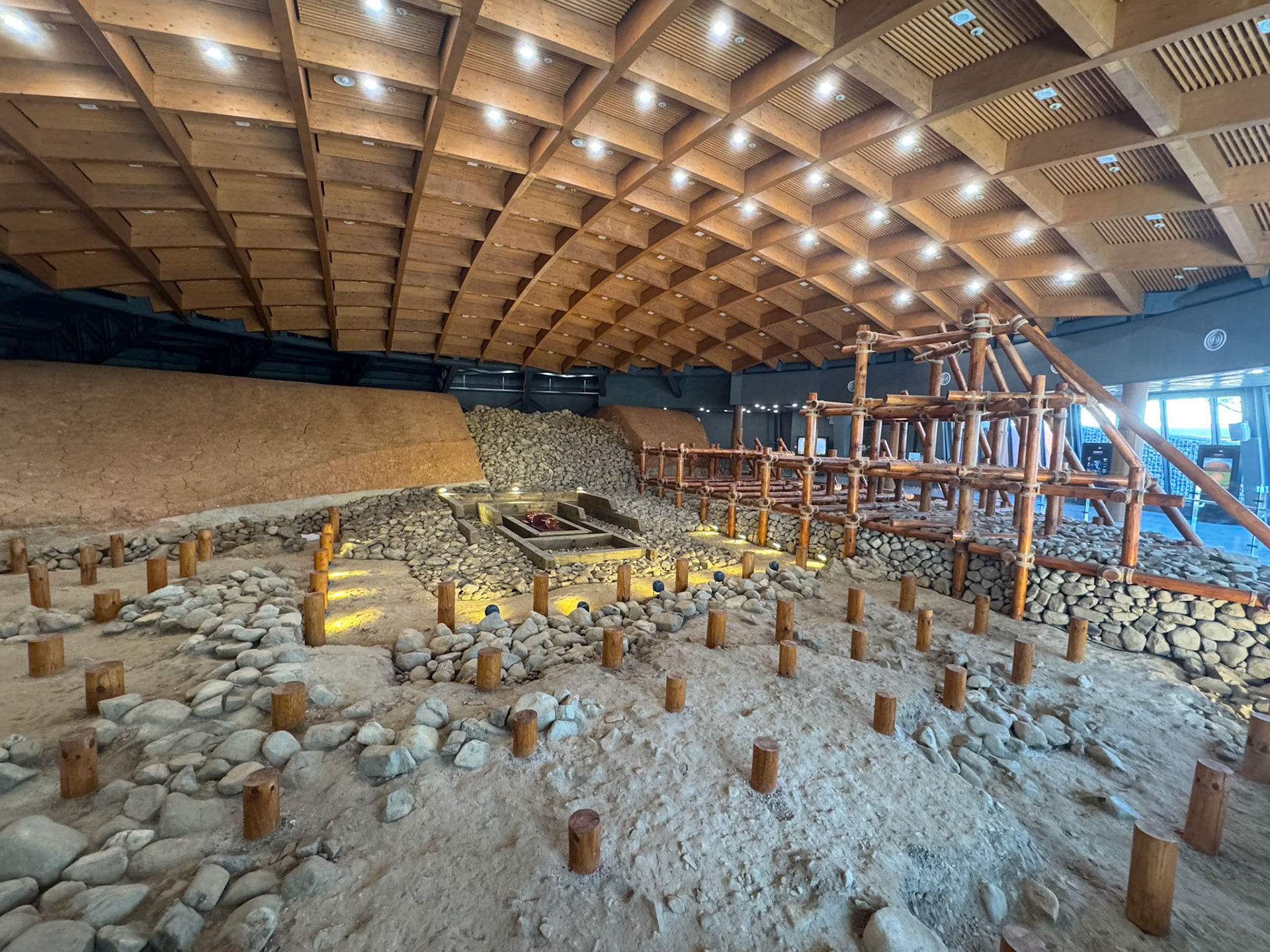 Gyeongju: Silla royal tomb contruct - wooden frame with stacked stones
