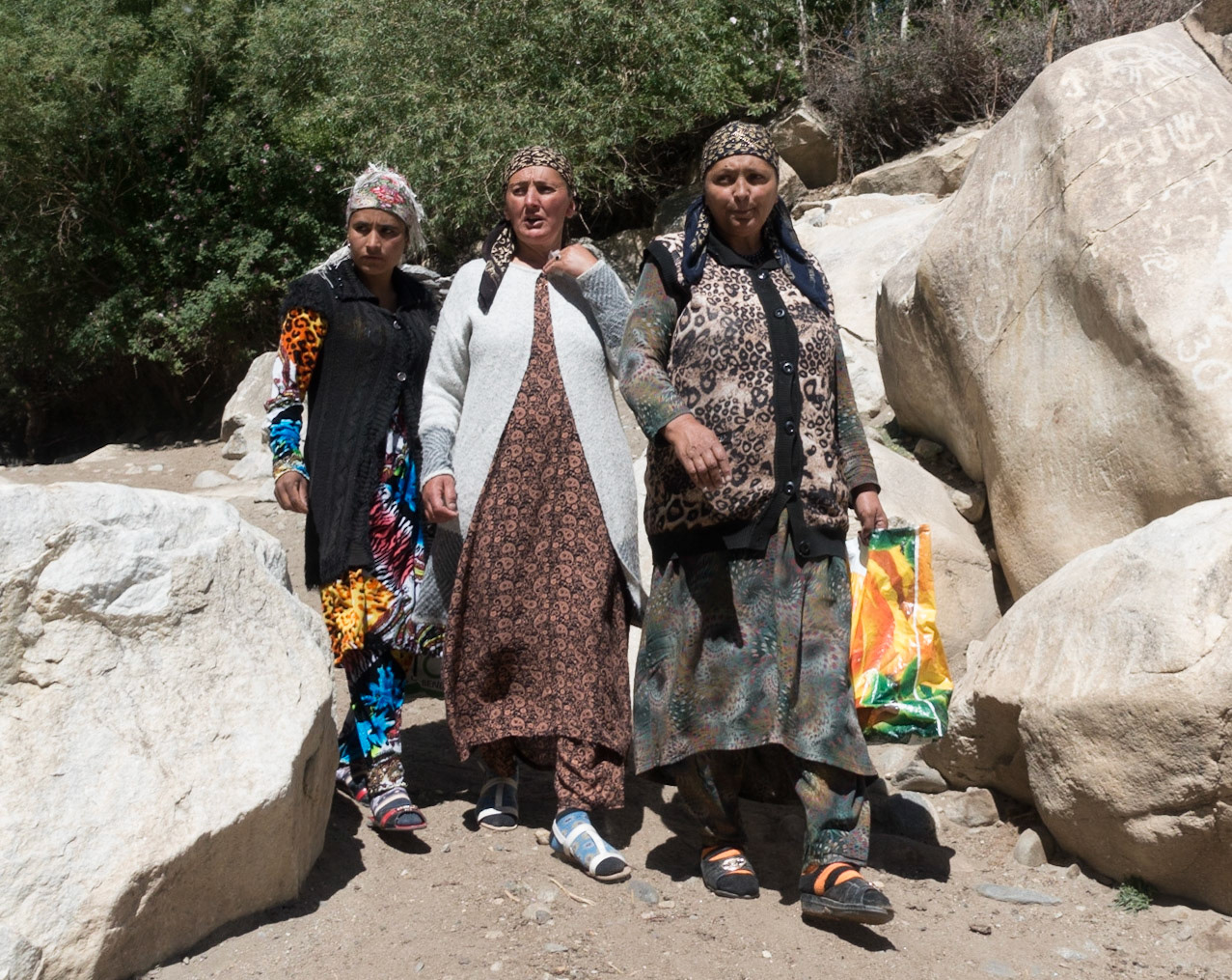 Vrang: Walk to Petroglyphs - Locals returning from tending Graves