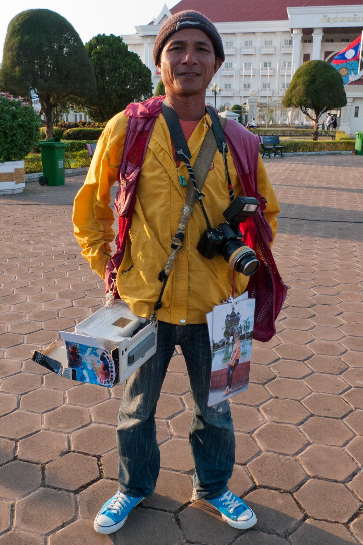 Vientiane: Photographer with photo printer
