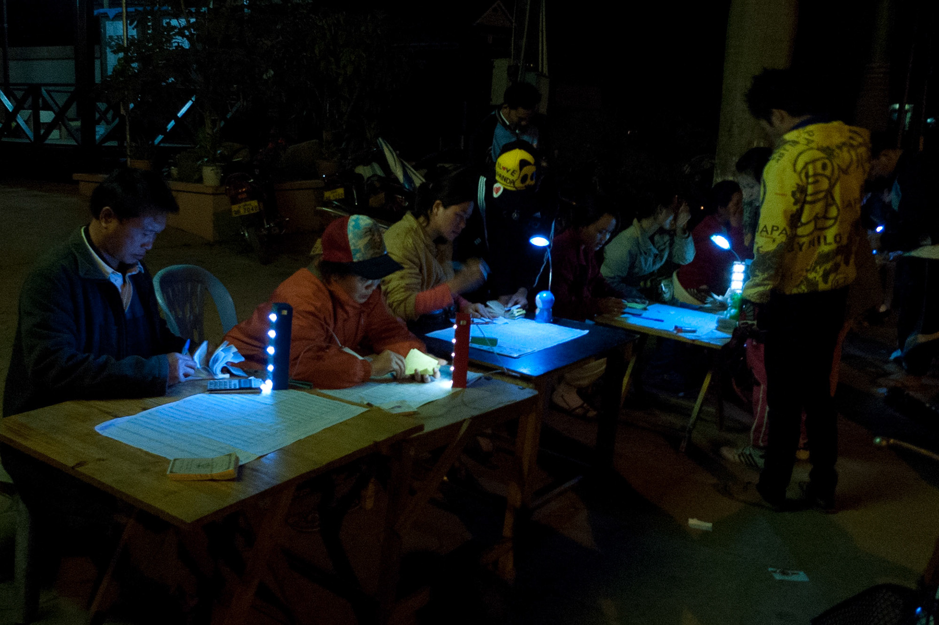 Luang Prabang to Luang Namtha: Nightime Lottery Sellers