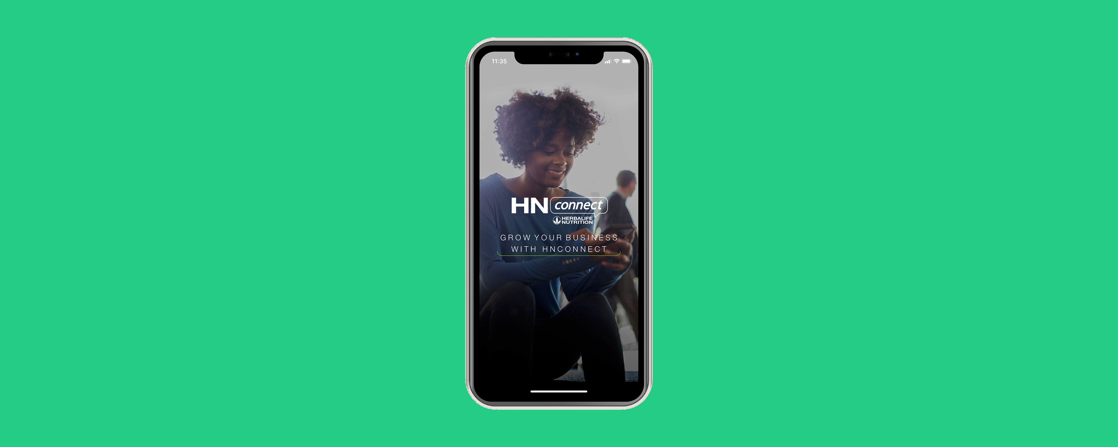 iPhone with the HNconnect logo on the screen.