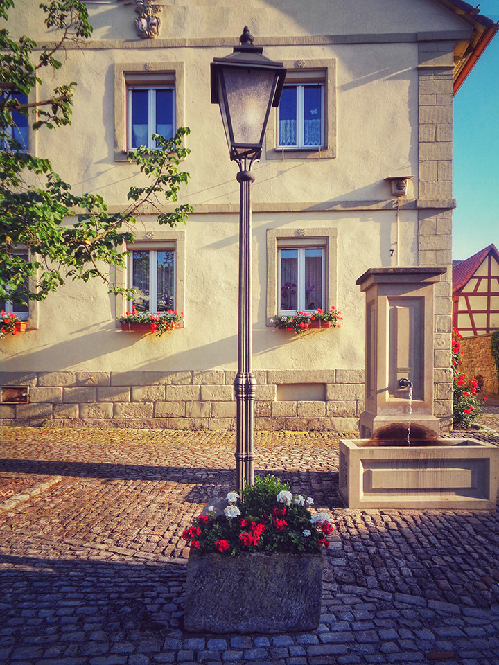 It's warm, it's summer and the mood is great. Like this scene nearly every franconian village spreads its charme and warm feelings.