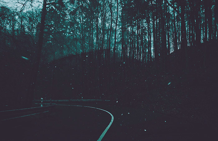 In the middle of the street in the cold frankonian highlands, the snow is coming now and it's getting cold, dark and eerie.