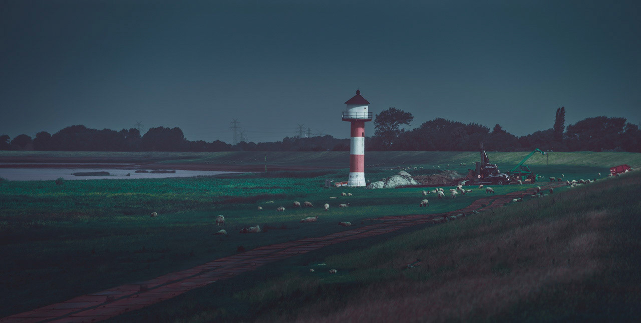 In the summer 2018 I went to the beautiful dikes of the Northern Elbe located near Hamburg. After a short walk I saw this scene with those sheeps and the beautiful old lighthouse. This capture stands for tranquility and the northern charm of Germany.
