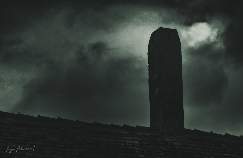 The night sun is shining at the lonely old chimney ... just a scary scene isnt it?