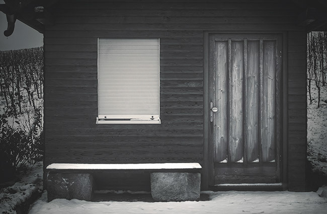 I love the minimalism of those small hut facades ... especially in winter.