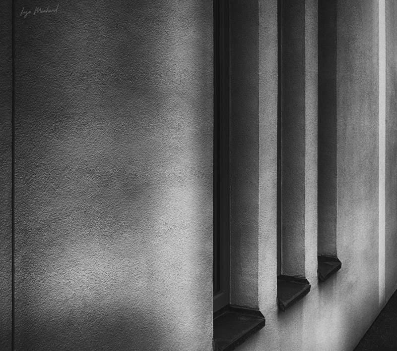 Close view to three slim and high windows combined with other vertically and diagonal lines.

Captured with Sony W830 and post-processed with Photoshop.