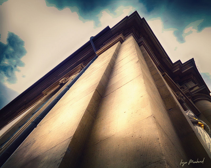 Low angle view to a church's facade from below. The lines will lead you directly to heaven ... maybe. 