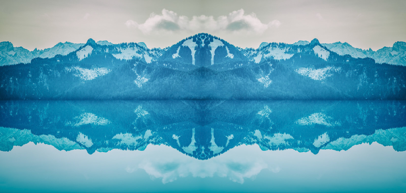 Surreal blue and mirrored landscape