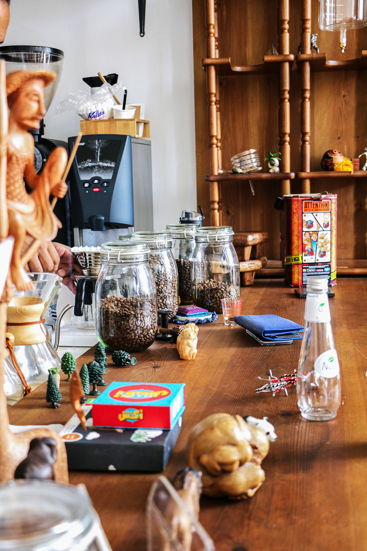 Coffee equipment, glassware and tools arranged on a café counter