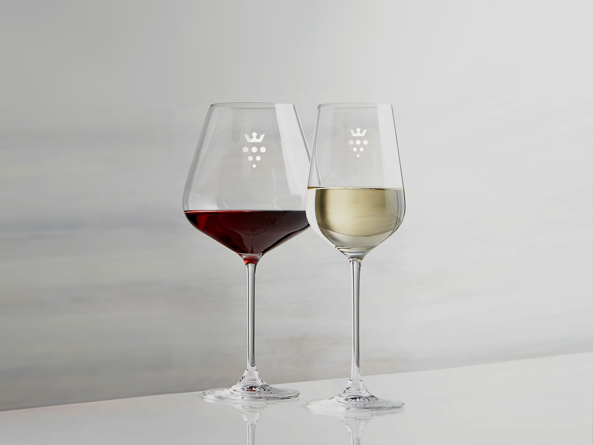 Crown vineyard logo on wine glasses