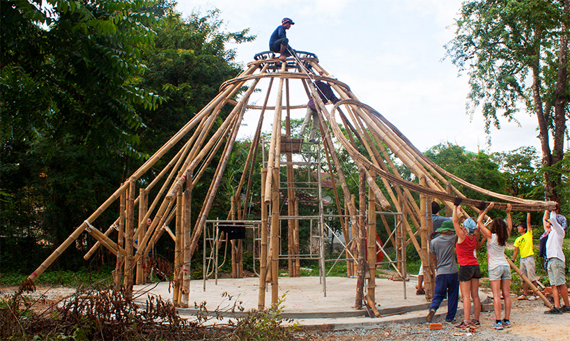 VOLUNTEERS INSTALLING THE ROOF RING