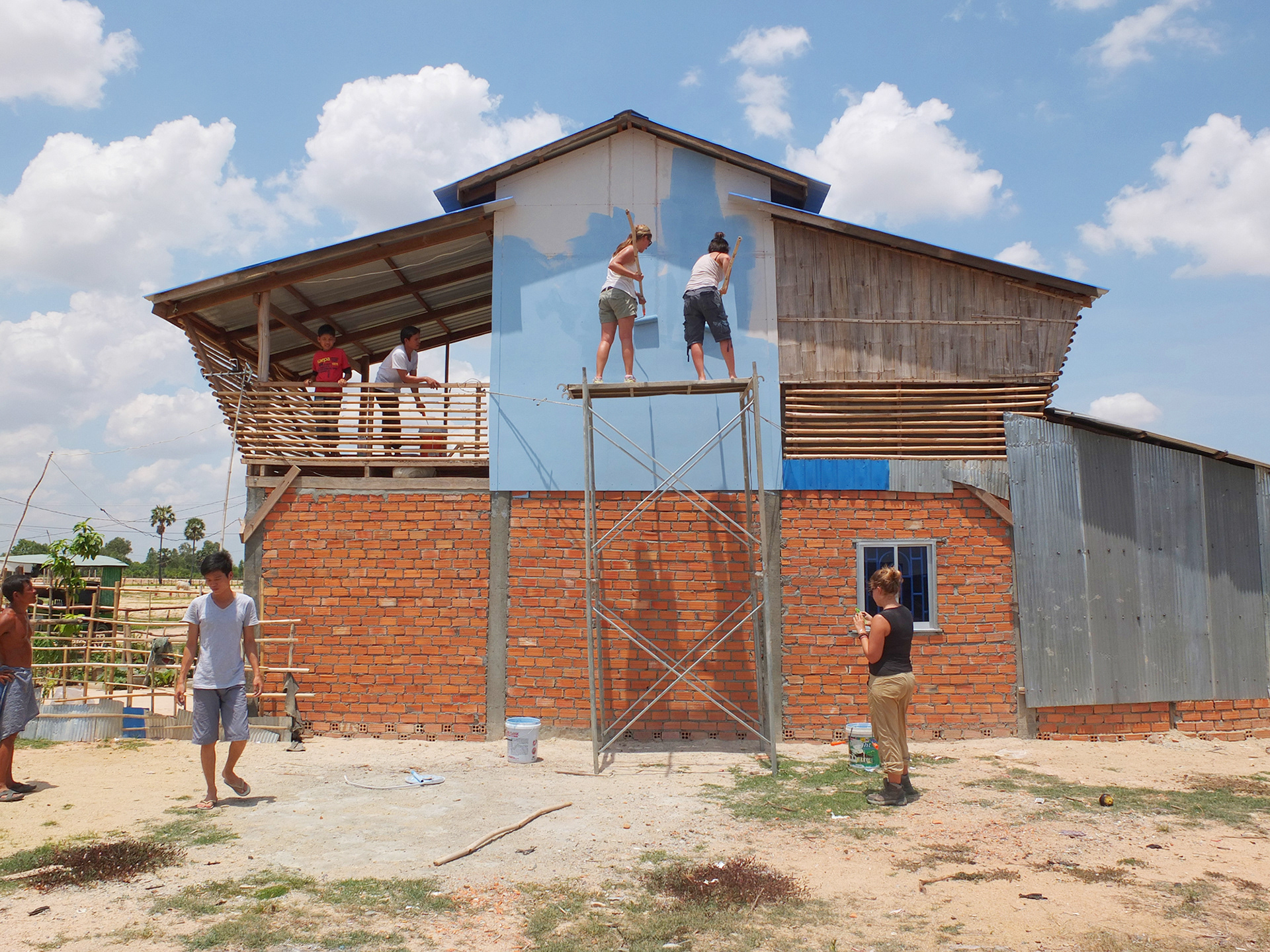 VOLUNTEERS PAINTING THE HOUSE (ME INCLUDED!)