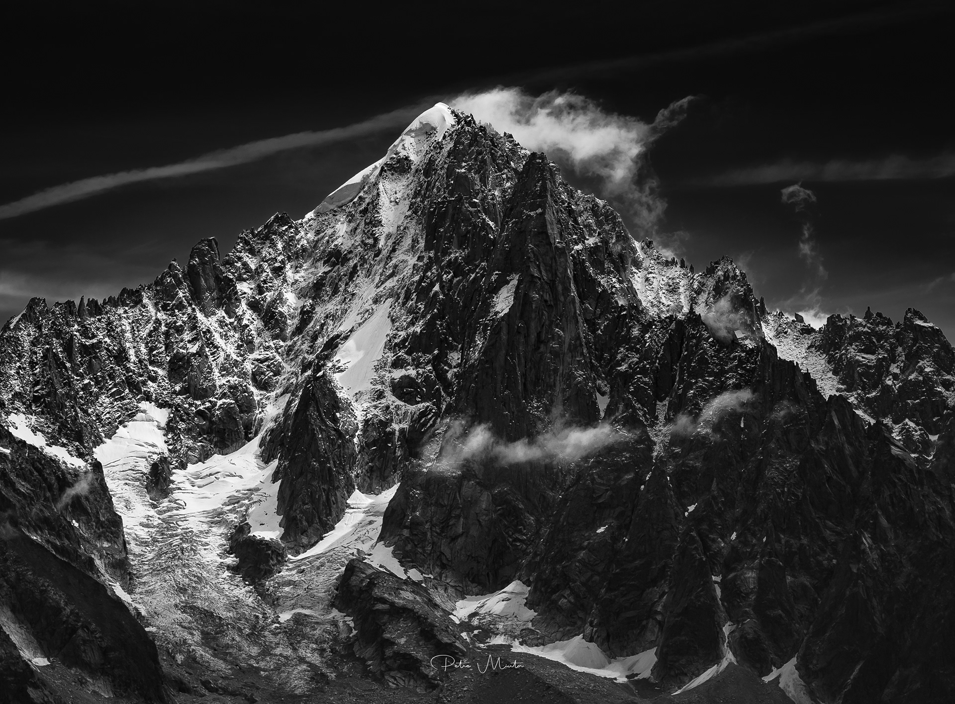 Aiguille Verte, crowned by the Arête du Moine, rising above the vast whiteness of the Talèfre face — a monument of stone and ice where silence holds its breath.