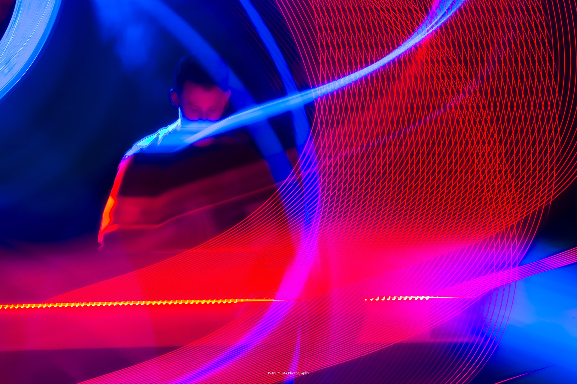 DJ beats, flowing lights, and the poetry of in-camera movement. Petre Miuta ICM Photography