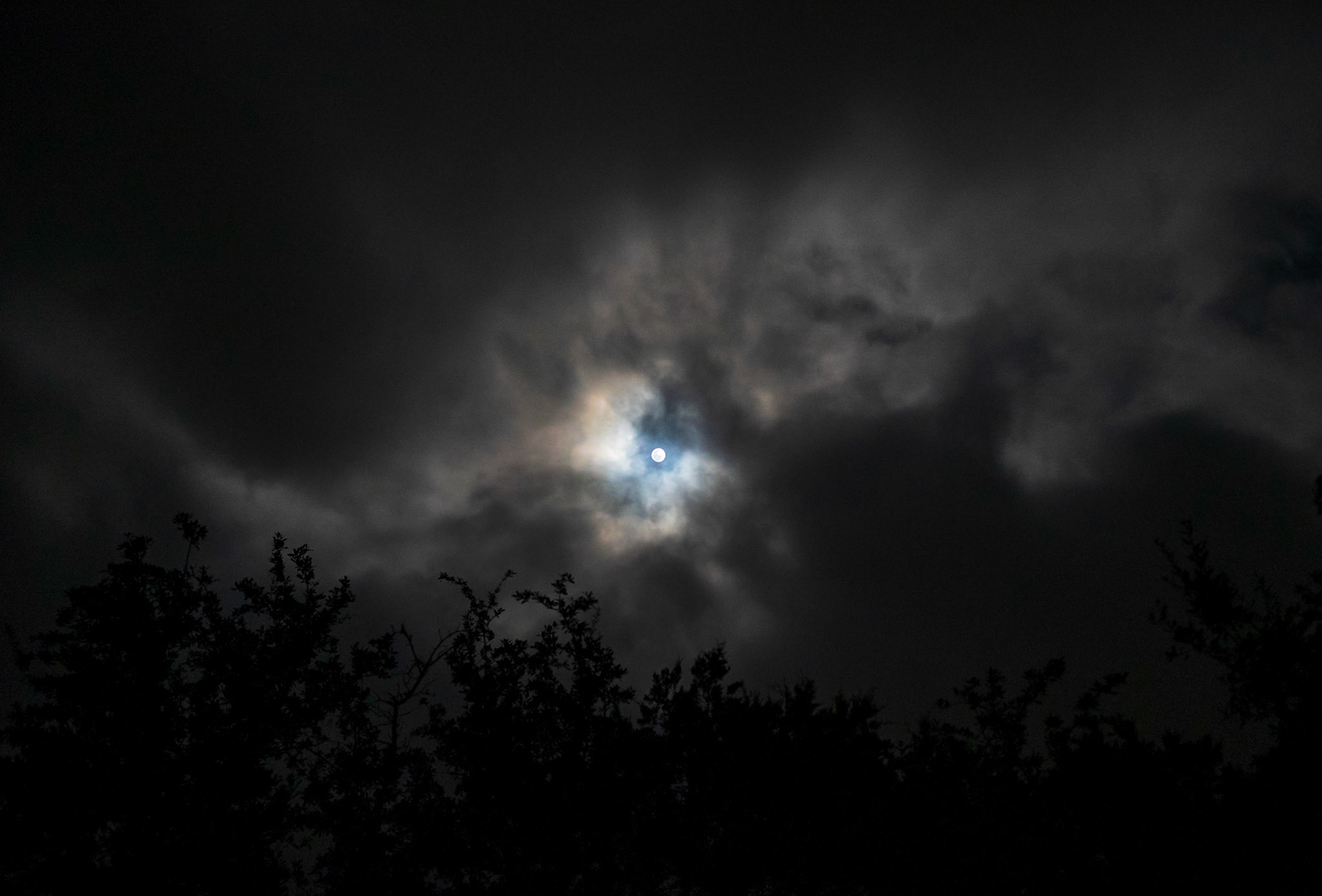 Light Behind Dark Clouds