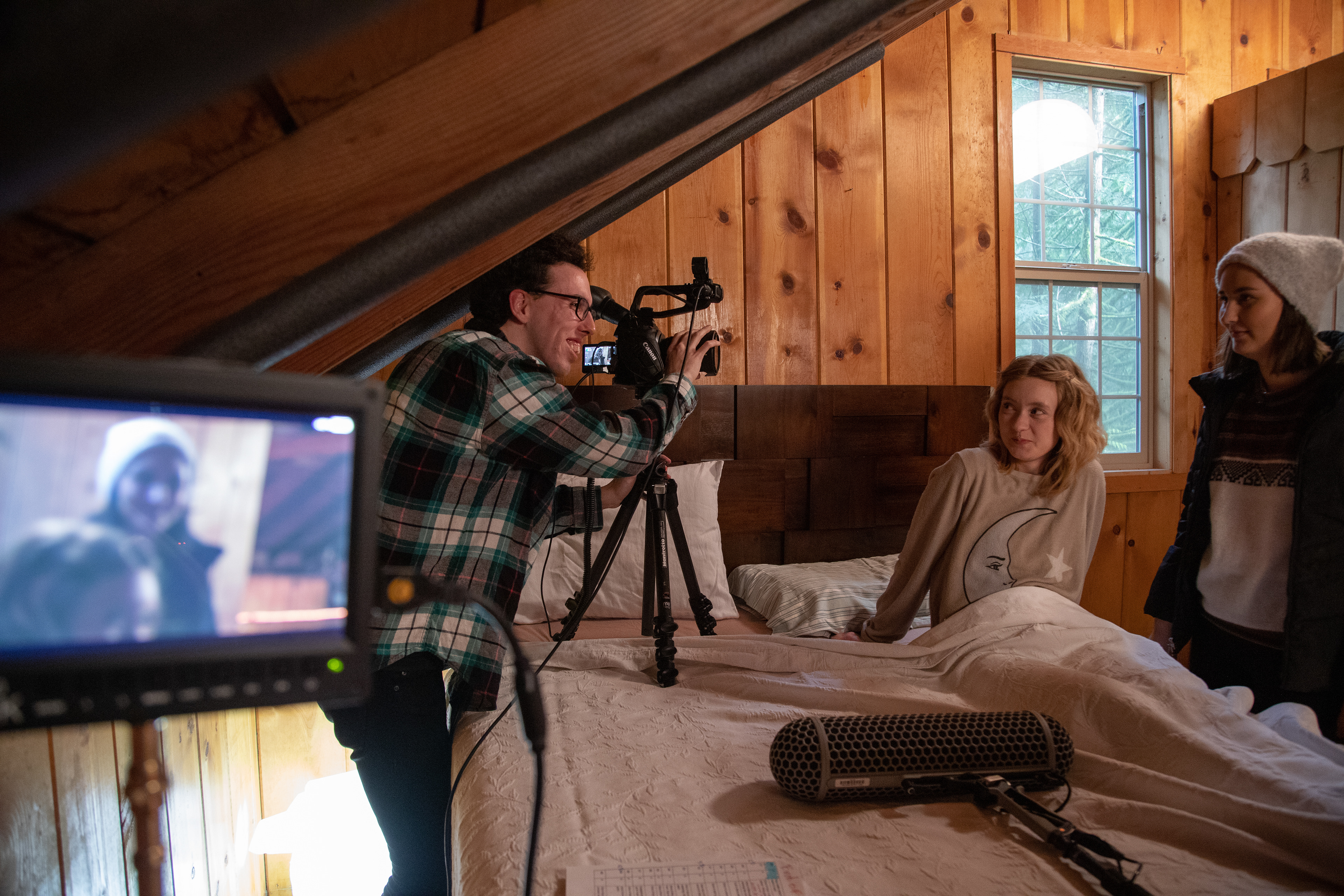 Behind the scene photo, of sky and two actors smiling