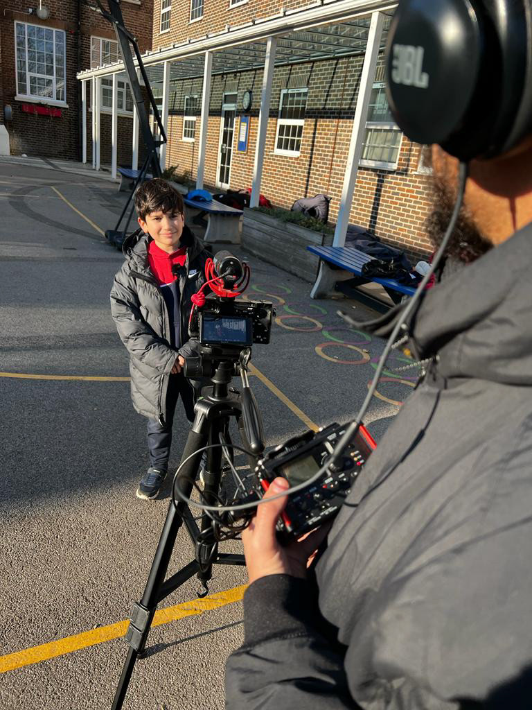 Capturing the enthusiasm of a young student as they share their favorite memory of the school.