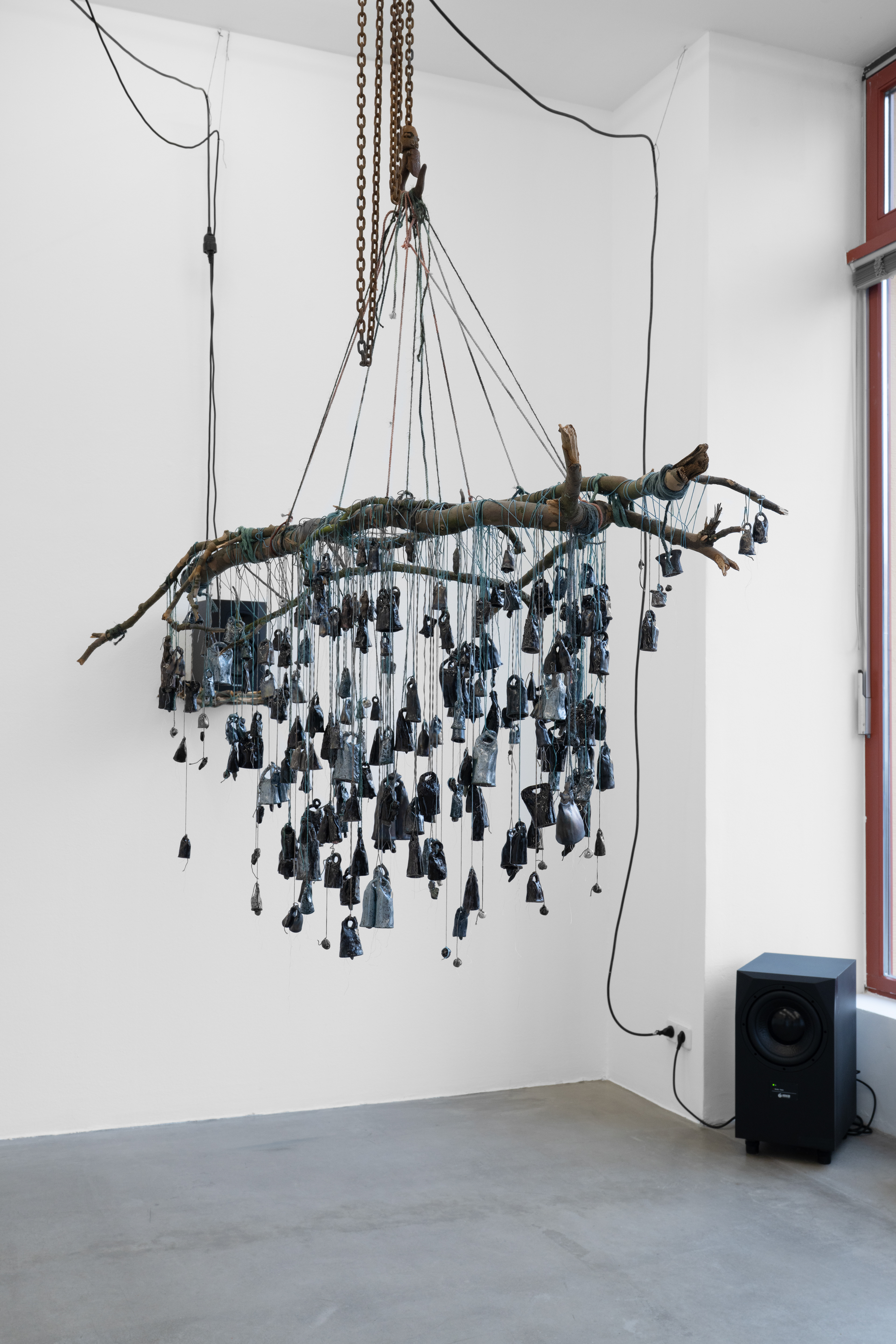 Umbratiles (the bells that did not ring), 2025, Cotton, glazed ceramics, pigment dye, wood, 185 x 28 x 84 cm