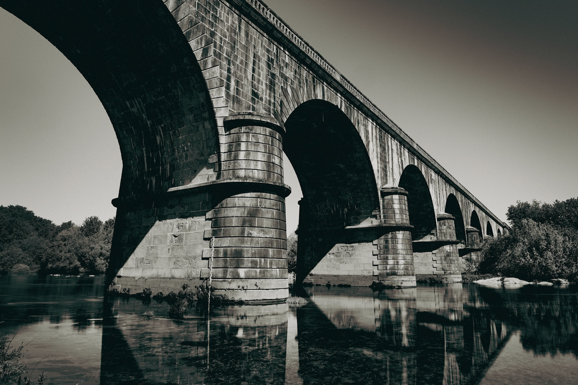 Arches Over Still Waters