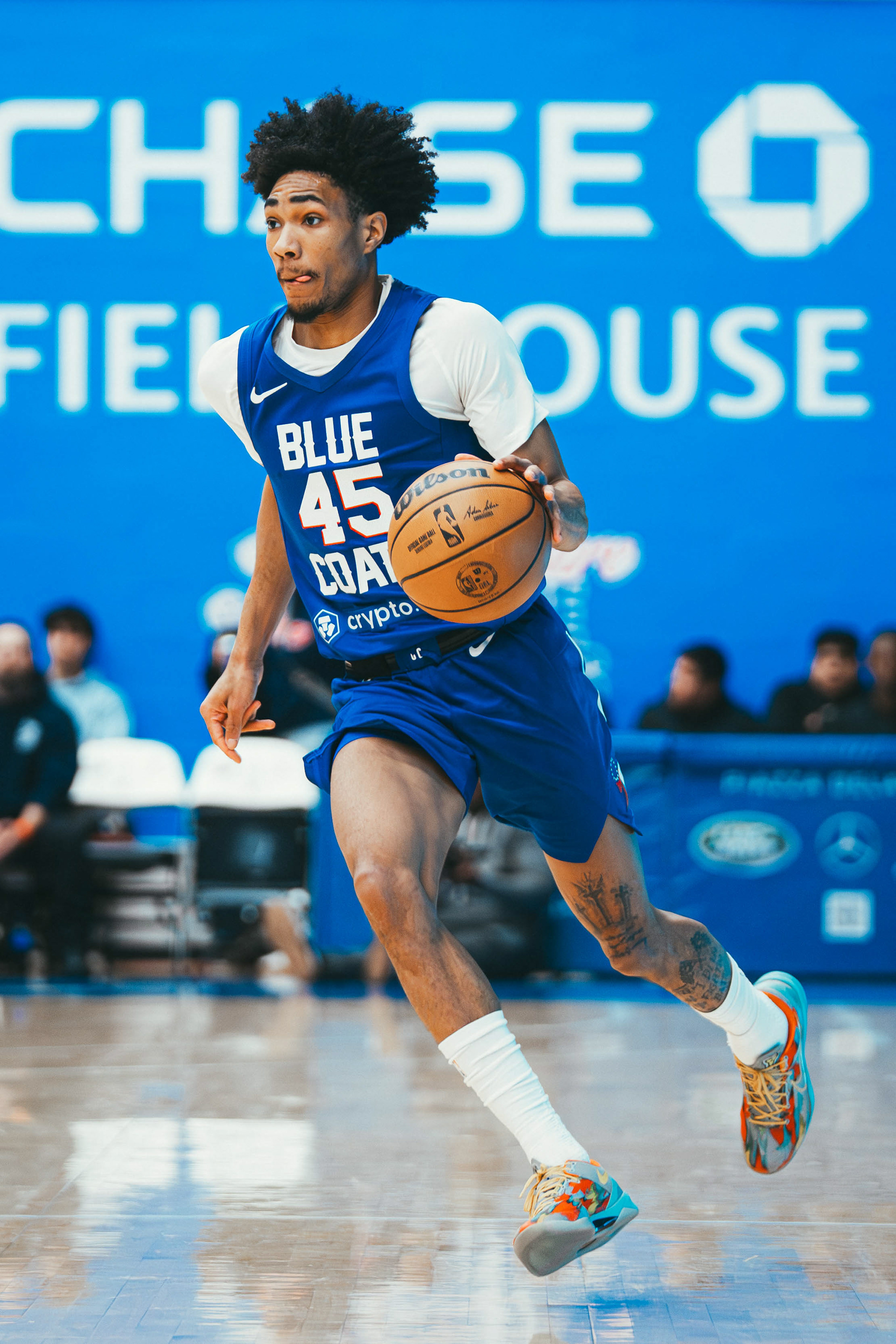 Delaware Blue Coats guard Hunter Sallis (45) brings the ball up the court during a game against the Greensboro Swarm at Chase Fieldhouse on Nov. 16, 2025.