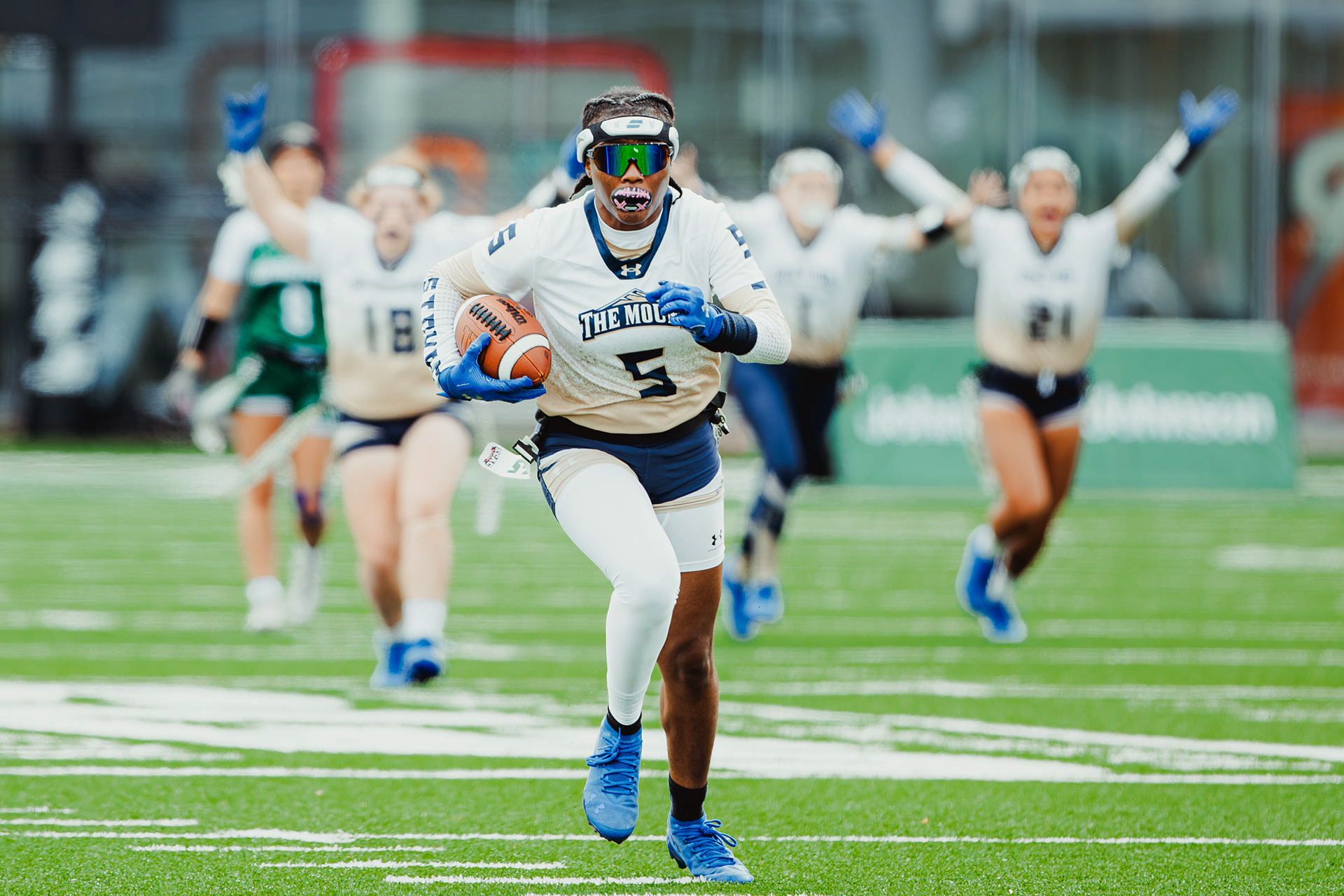 Mount St. Mary University's cornerback Arieon Stokes (5) runs the ball back for a touchdown after an interception against Wagner University at Atlantic Health Jets Training Center in Florham, N.J., on May 2, 2026.