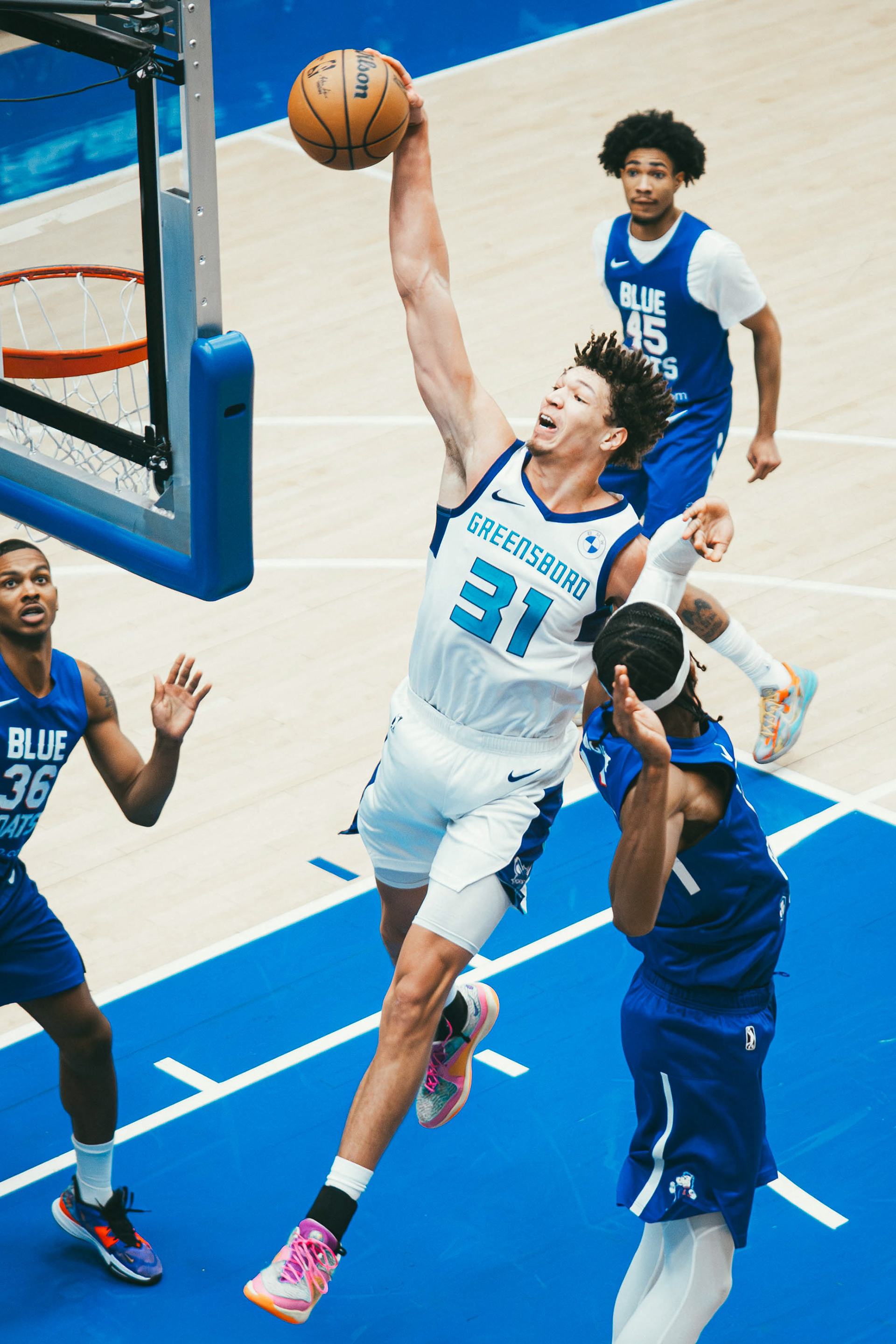 Greensboro Swarm forward Tidjane Salaün (31) dunks the ball against the Delaware Blue Coats during the second quarter. The Blue Coats hosted the Swarm at Chase Fieldhouse in Wilmington, DE., on Nov. 14, 2025.