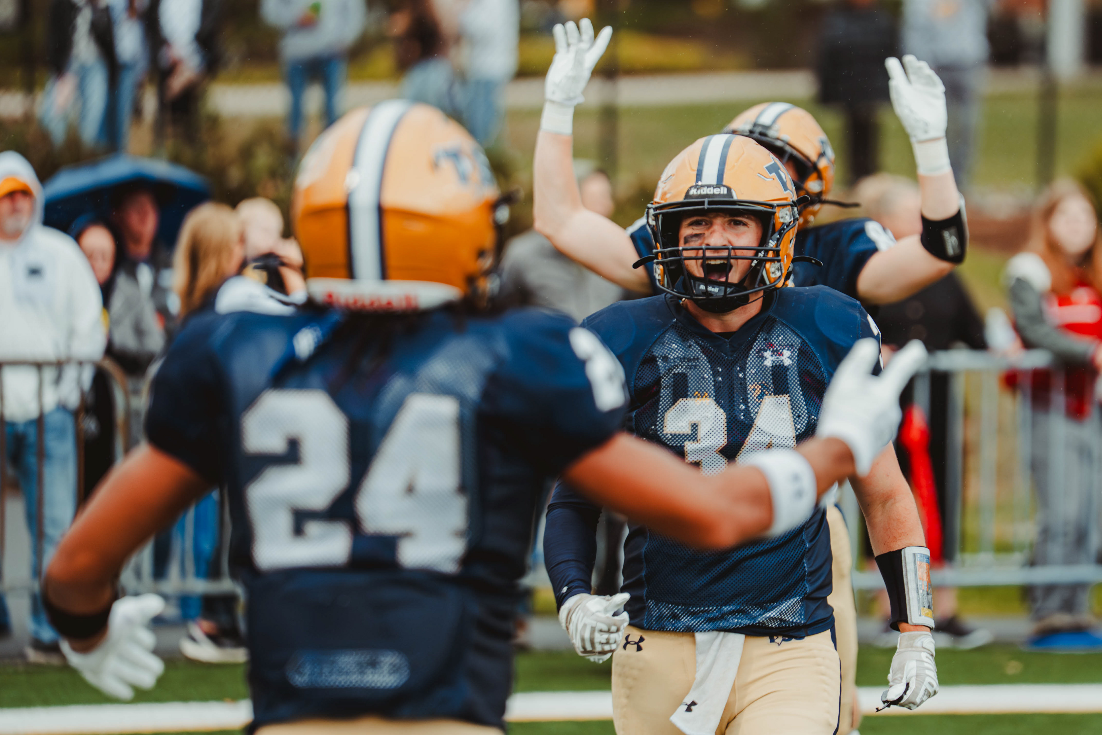 The College of New Jersey running backs Jordan Morrell (24) and Joe Visaggio (34) celebrate a touchdown against William Paterson at Lions Stadium in Ewing, N.J., on Oct. 11, 2025.