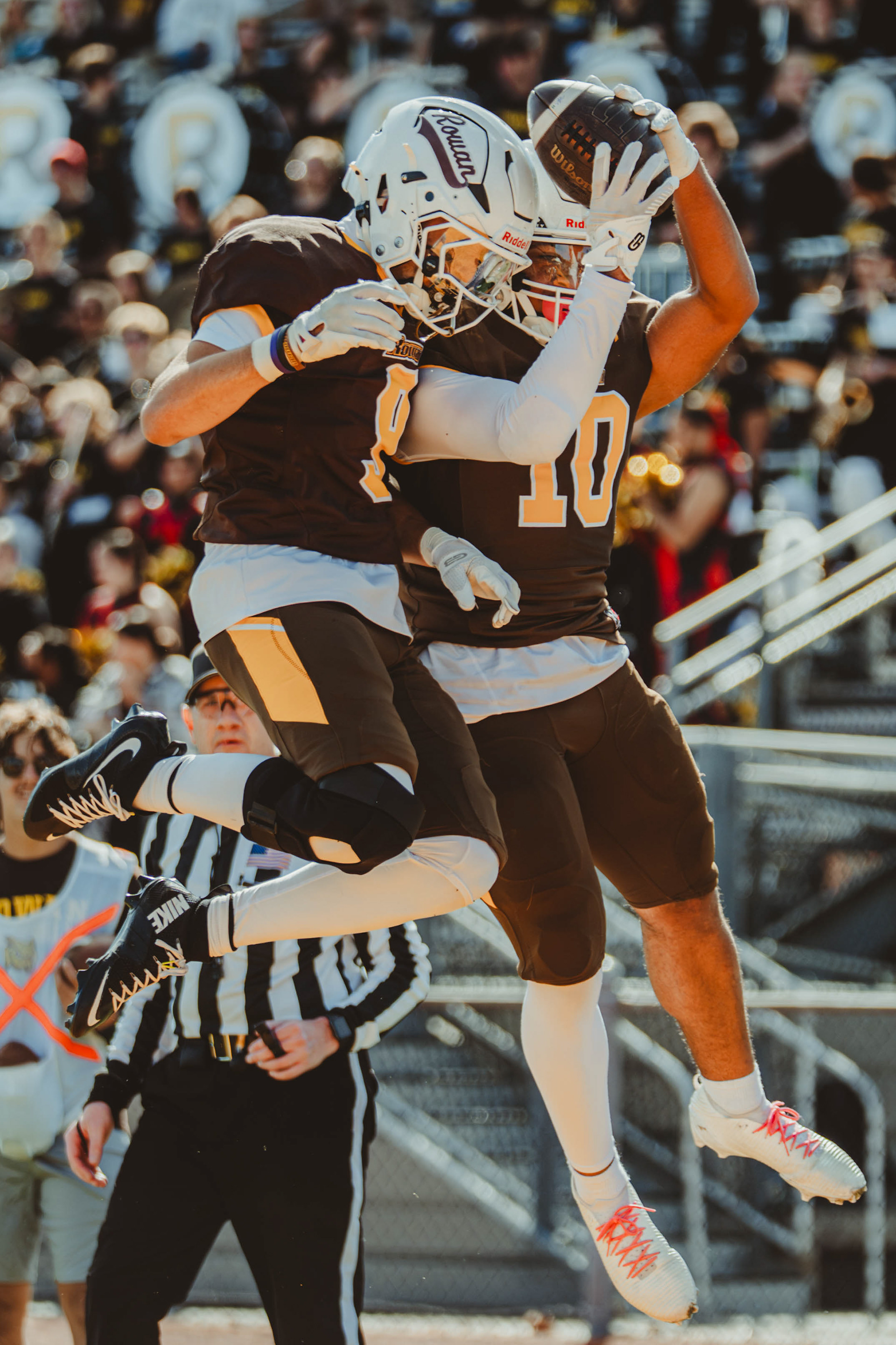 Rowan University wide receivers Michael Zarfati (9) and Jamir Rowe (10) celebrate after a touchdown against Salisbury University at Coach Richard Wackar Stadium in Glassboro, N.J., on Oct. 25, 2025.