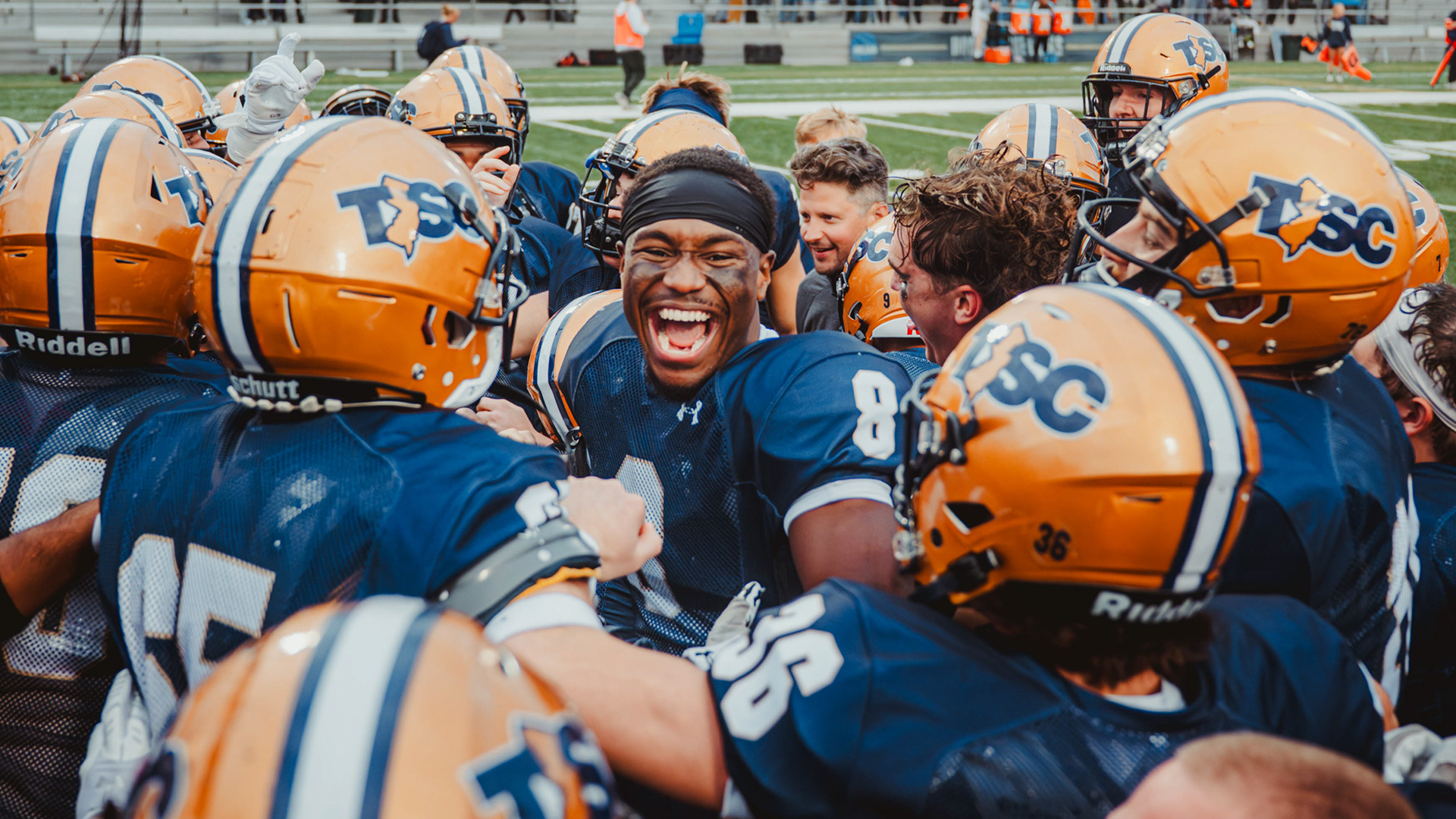 The College of New Jersey defensive backs Christian Bennett (8) celebrates a win against William Paterson University at Lions Stadium in Ewing, N.J., on Oct. 11, 2025.
