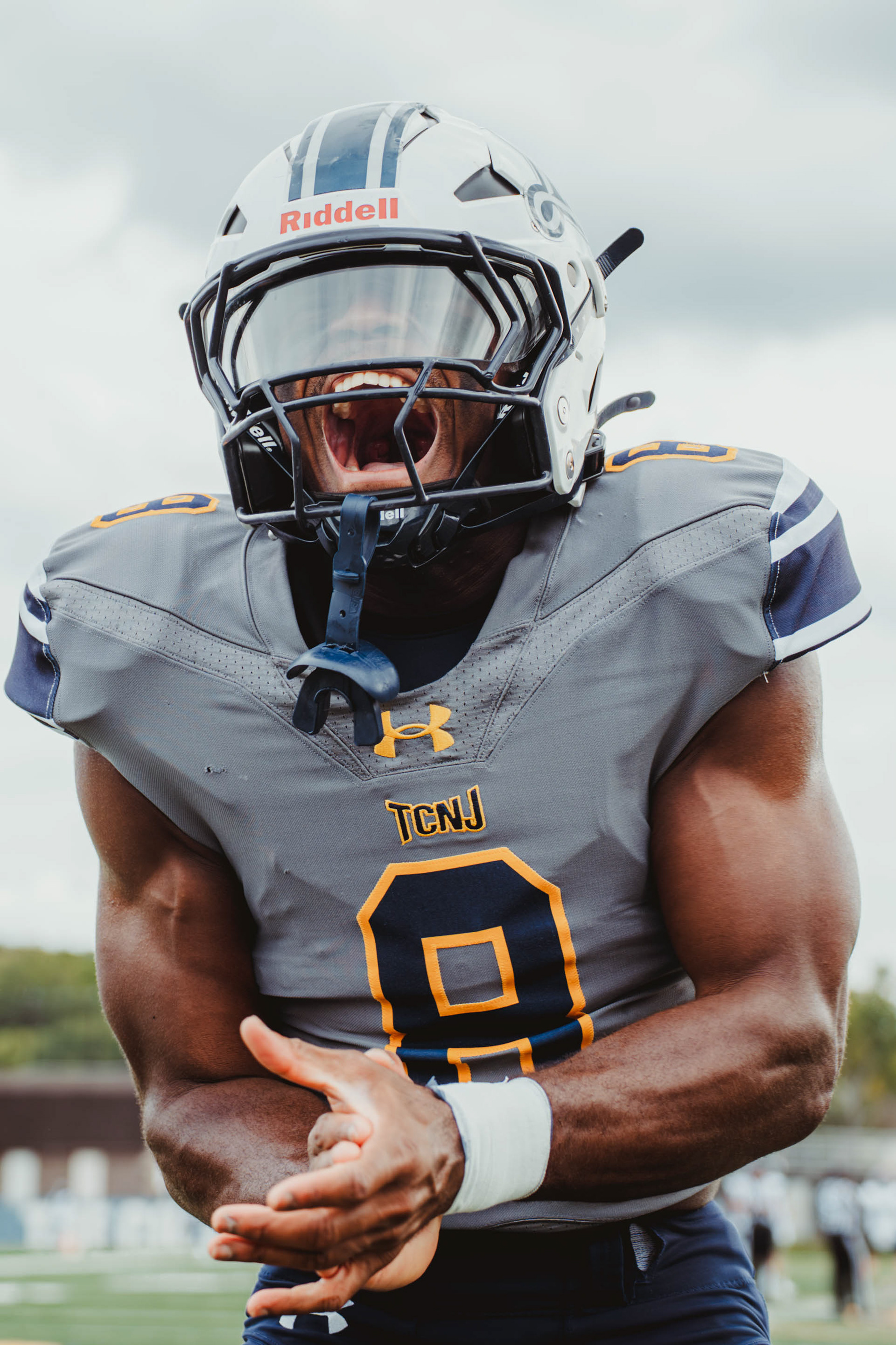 The College of New Jersey defensive back Christian Bennett (8) screams during pregame warmups before a game against Kean University at Lions Stadium in Ewing, N.J., on Oct. 25, 2025.