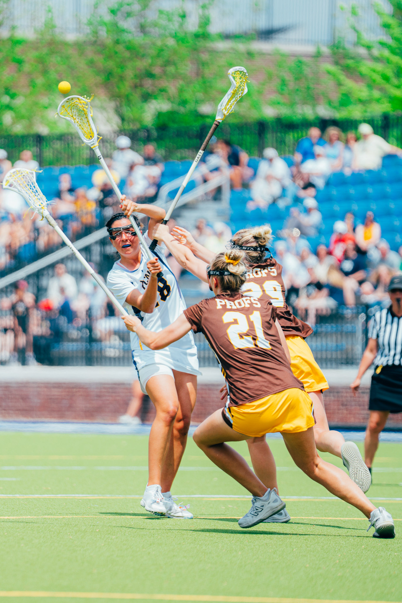 The College of New Jersey lacrosse player Marissa Lucca (18) passes the ball during a game against Rowan University at TCNJ Field Hockey and Lacrosse Complex in Ewing, N.J., on Apr. 26, 2025.