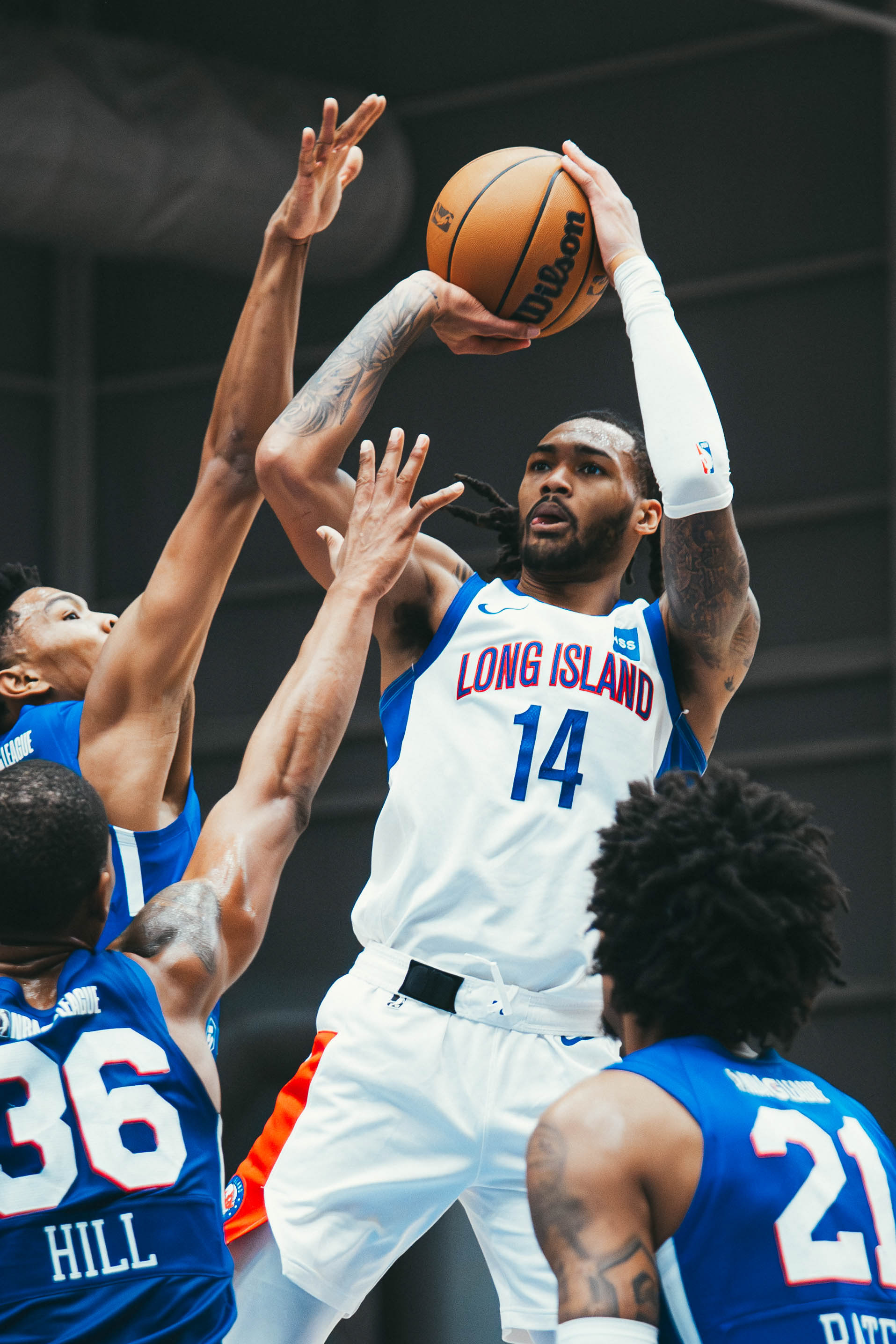 Long Island Nets guard D’Andre Davis (14) shoots during a game against the Delaware Blue Coats at Chase Fieldhouse on Dec. 6, 2025.