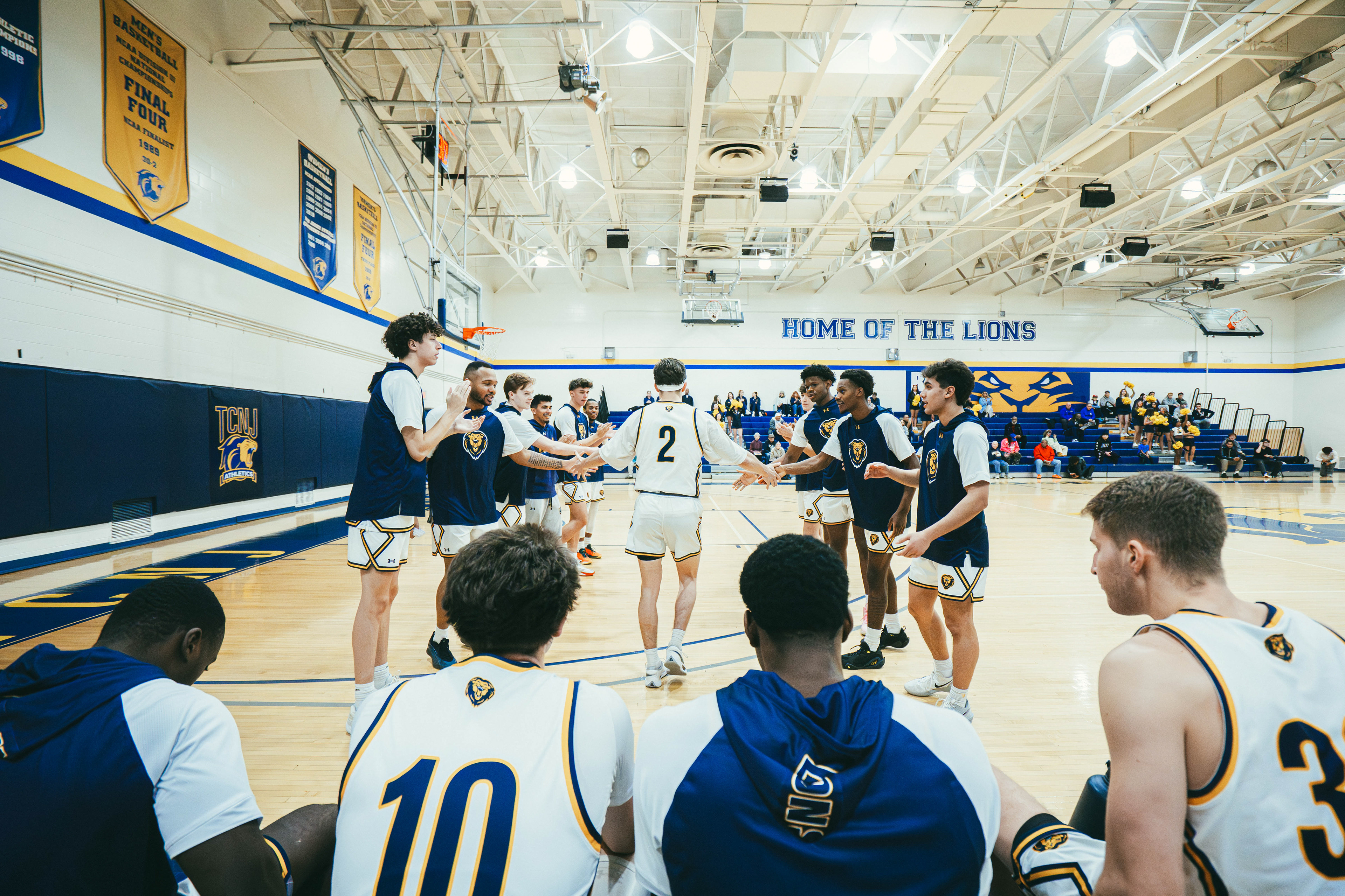 The College of New Jersey guard Nick Koch (2) is introduced before a game against Kean University at Packer Hall in Ewing, N.J., on Dec. 6, 2025.