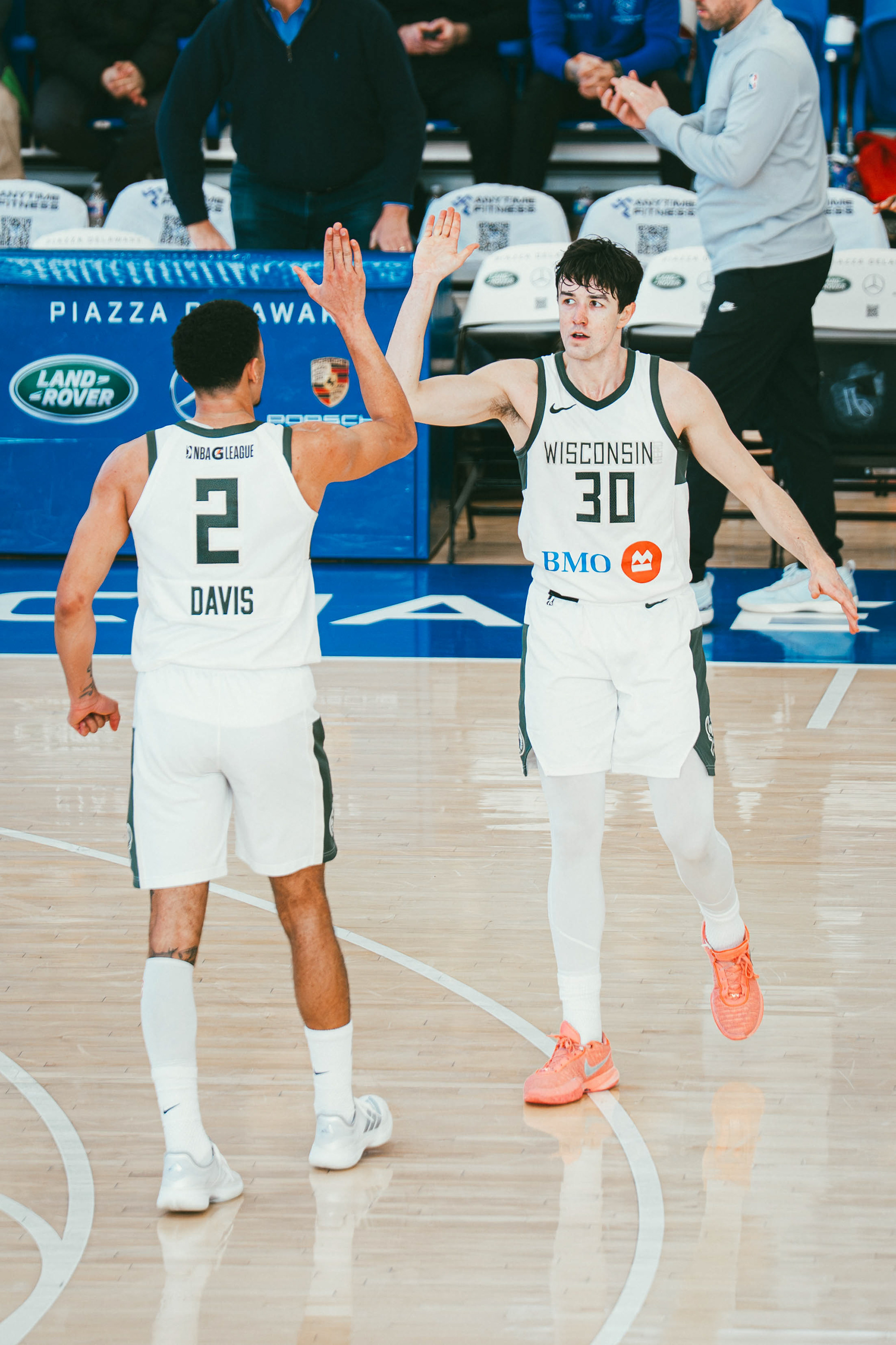 Wisconsin Herd guard Cormac Ryan (30) high-fives teammate Johnny Davis (2) during a game against the Delaware Blue Coats at Chase Fieldhouse in Wilmington, DE., on Feb. 5, 2026.
