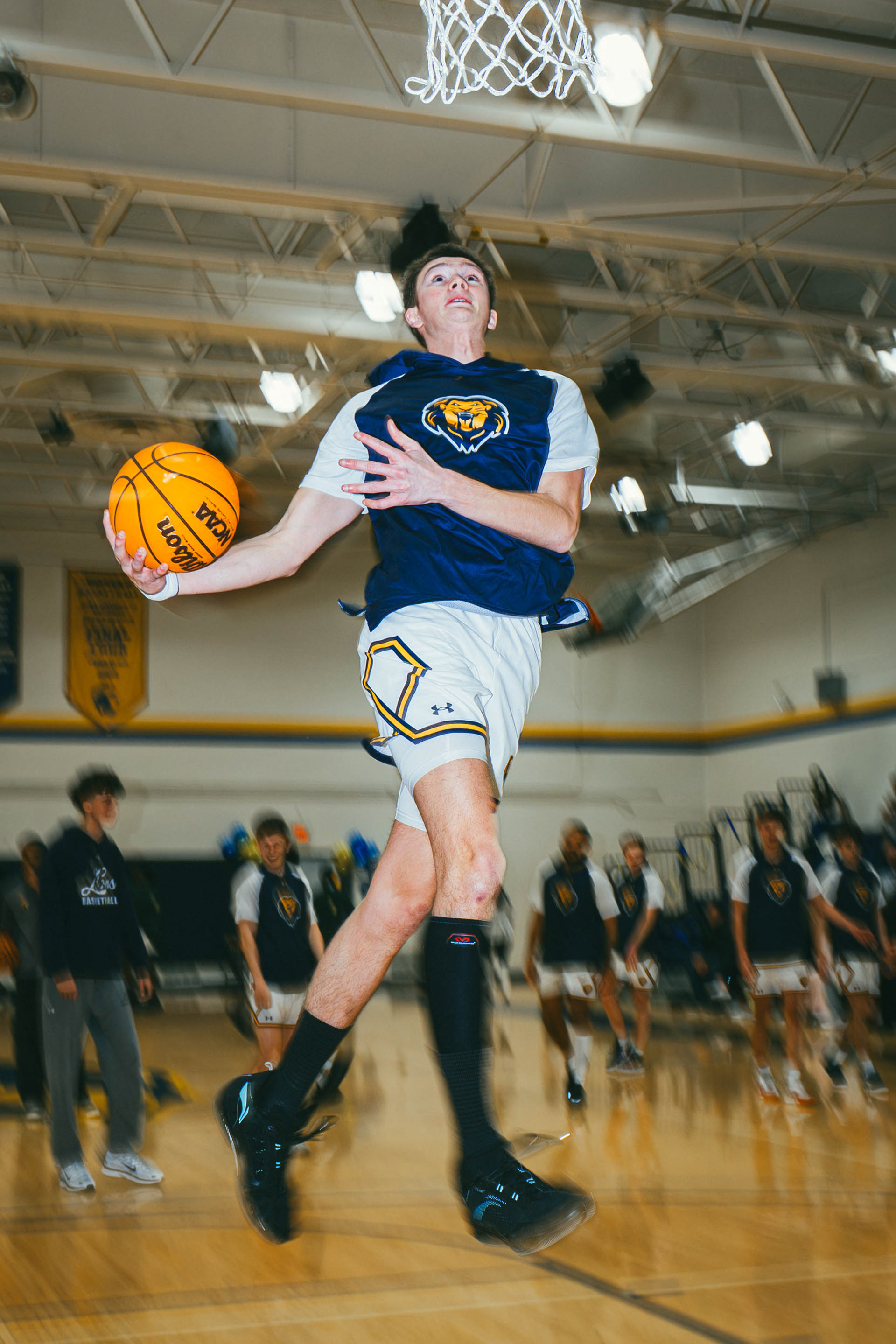 The College of New Jersey forward Daniel Yarus (10) dunks during pregame warmups before a game against New Jersey City University at Packer Hall in Ewing, N.J., on Jan. 17, 2026.