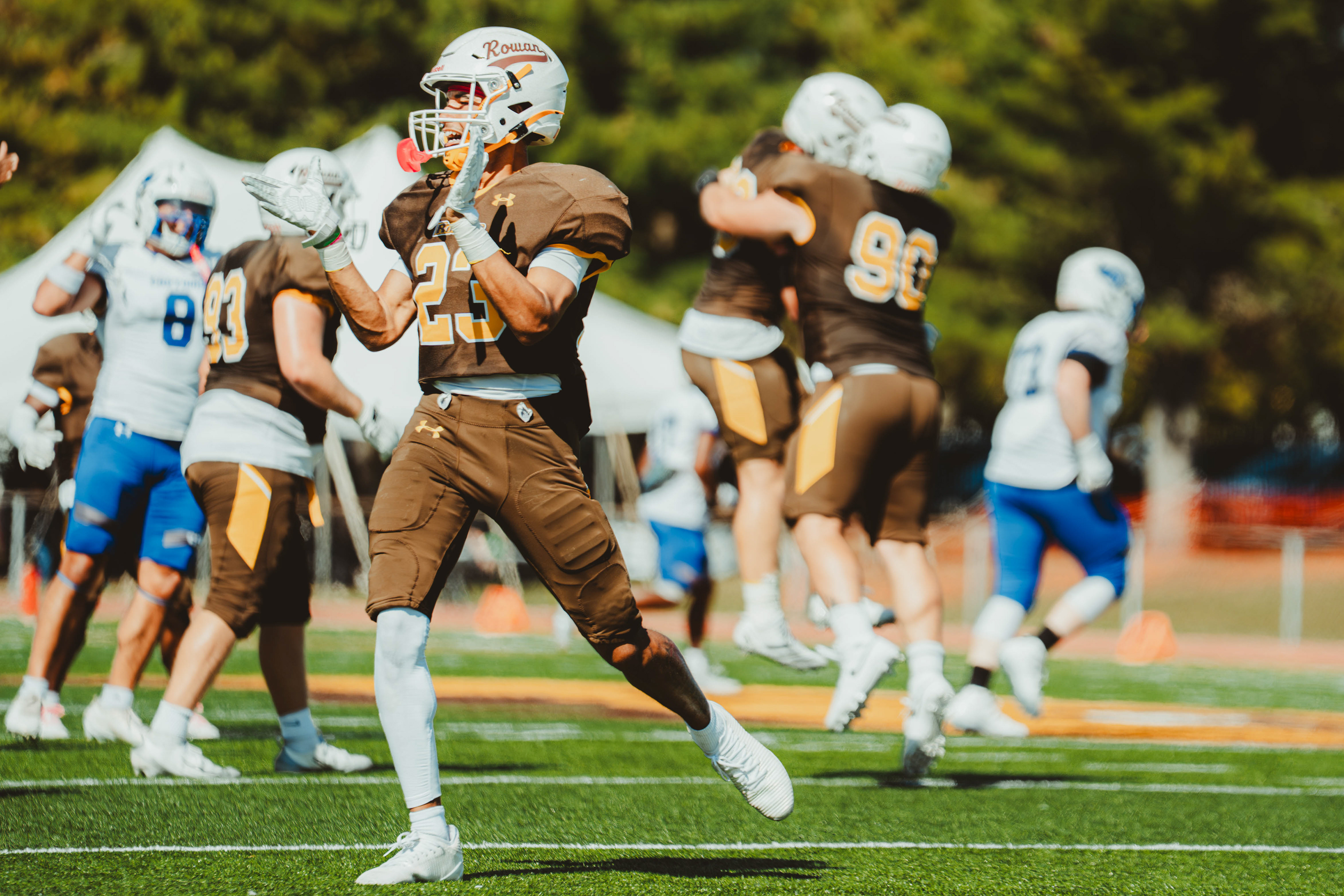 Rowan University defensive back Jayden Ayala (23) celebrates after a fourth-down turnover against Christopher Newport University at Coach Richard Wackar Stadium in Glassboro, N.J., on Oct. 4, 2025.