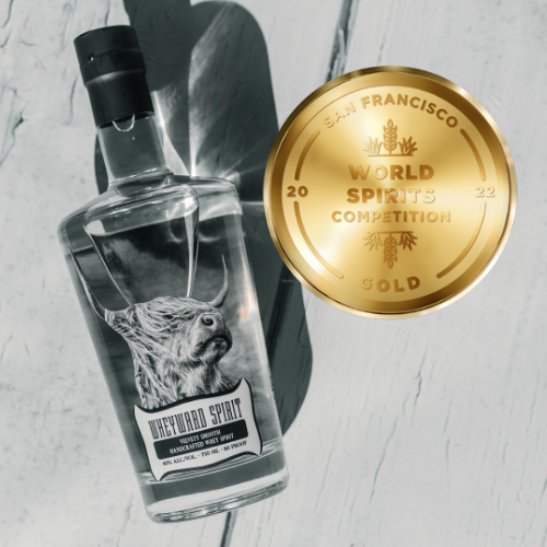 Wheyward Spirit bottle and a Gold medal from the San Francisco World Spirits Competition