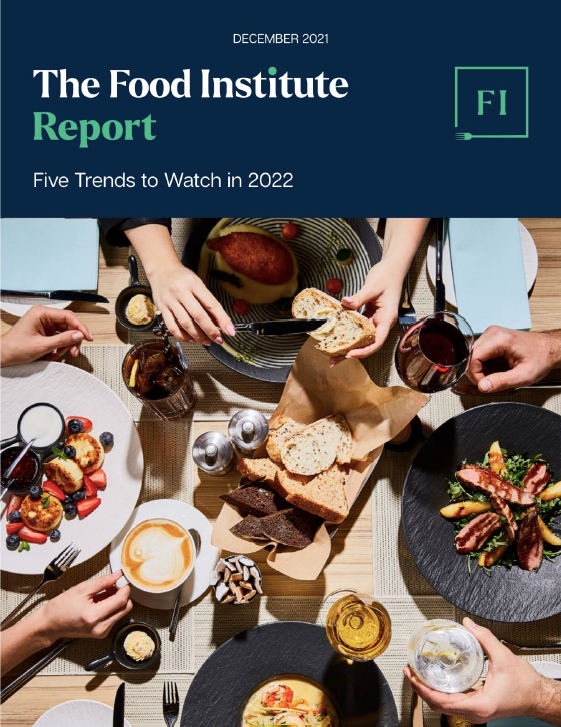 Cover of The Food Institute's "Five Trends to Watch in 2022" Report shows three people eating around a table from above.