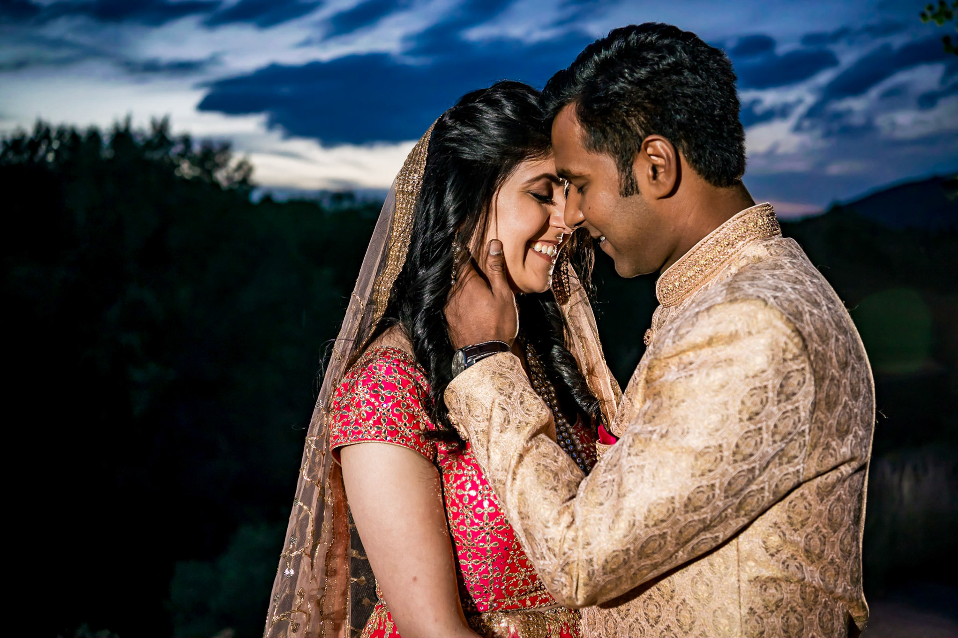 Colorful Indian wedding reception at the Aspen Meadows Resort in Aspen Colorado. Fall colors and fun dance party.