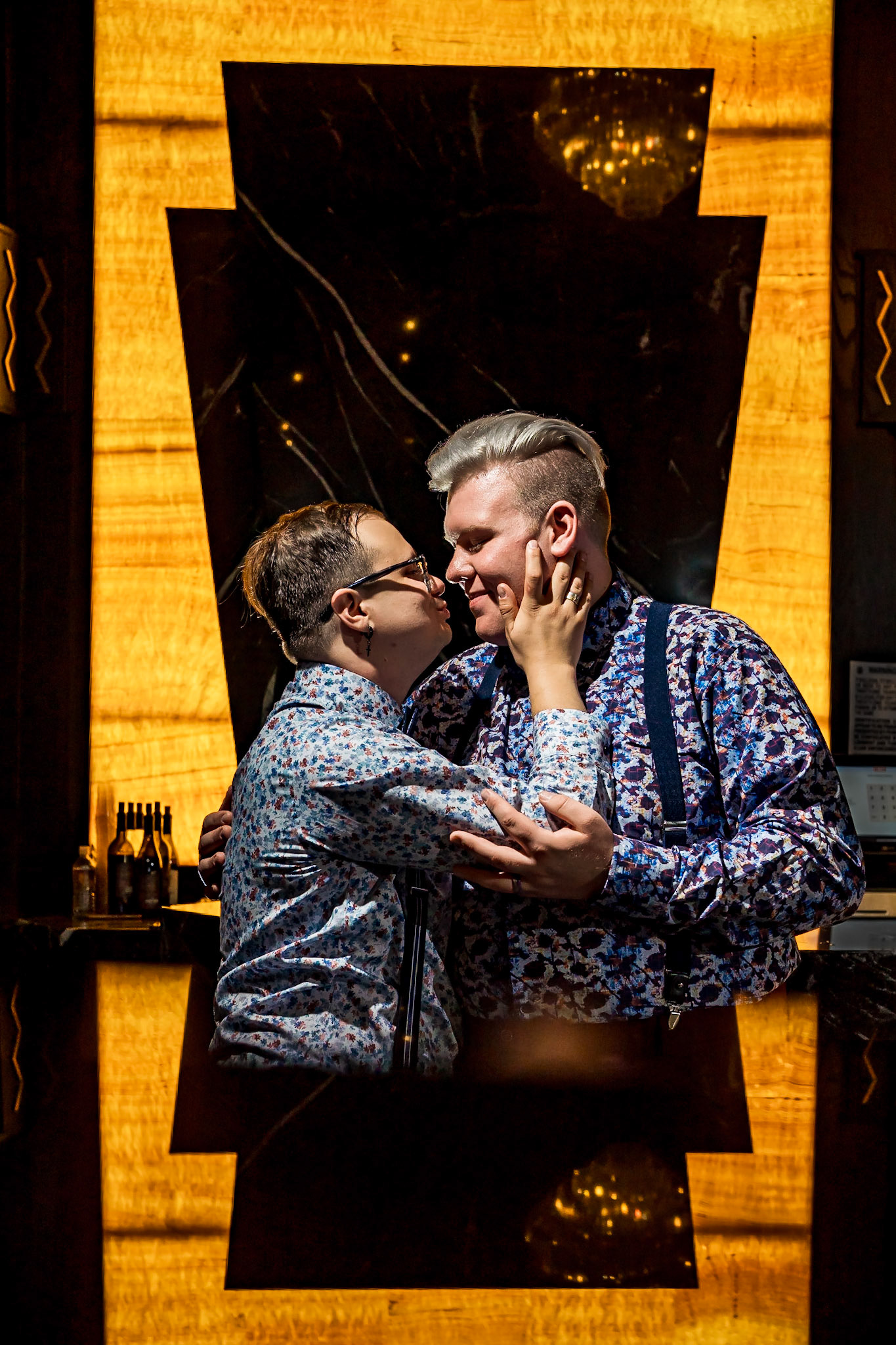 Bold, vibrant, and dramatic wedding photography at an LGBTQ+ wedding at Ironworks in Denver, Colorado