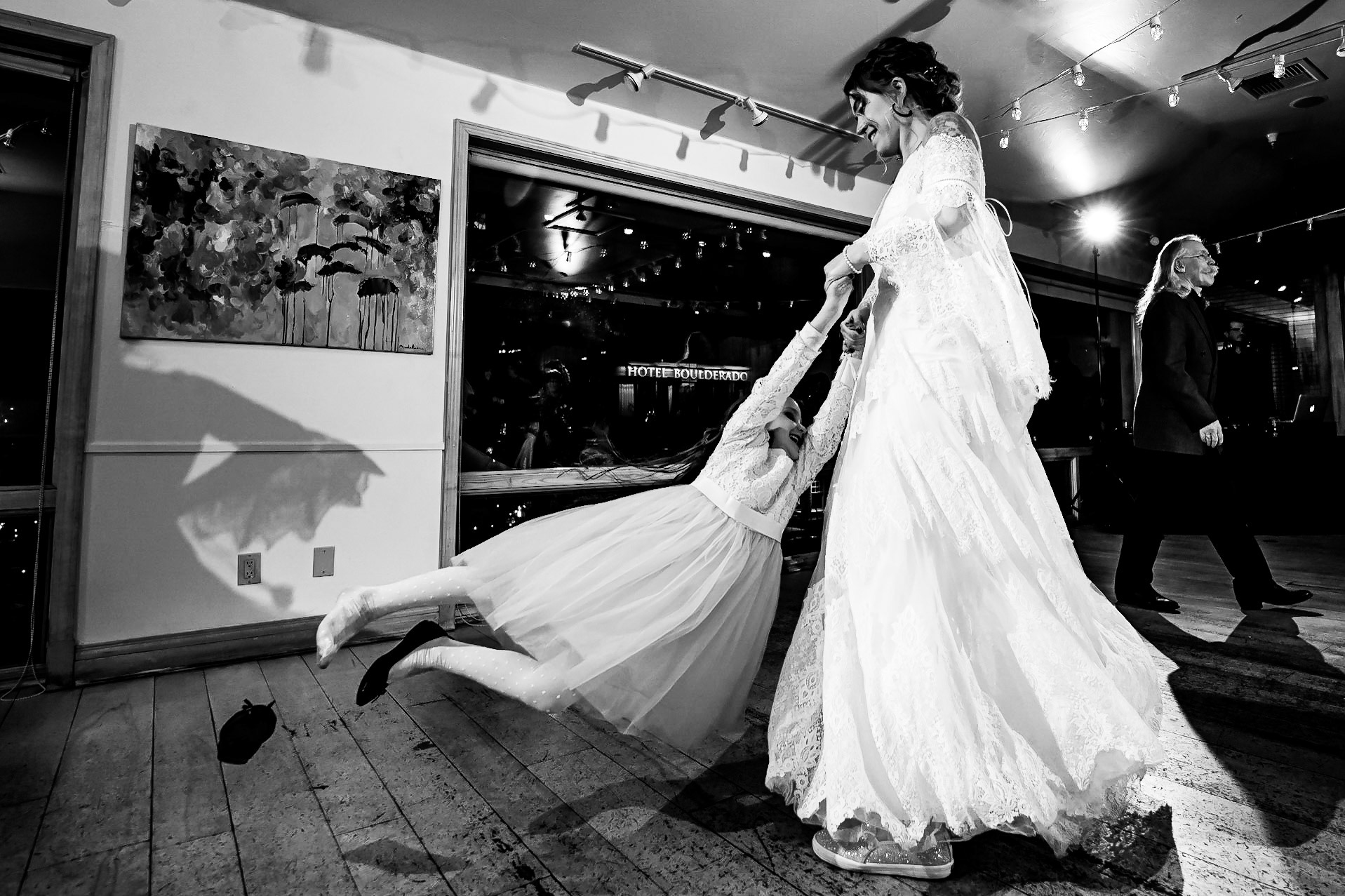 Colorful wedding at the Rembrandt Yard in Boulder, Colorado. Corgi ring bearer.