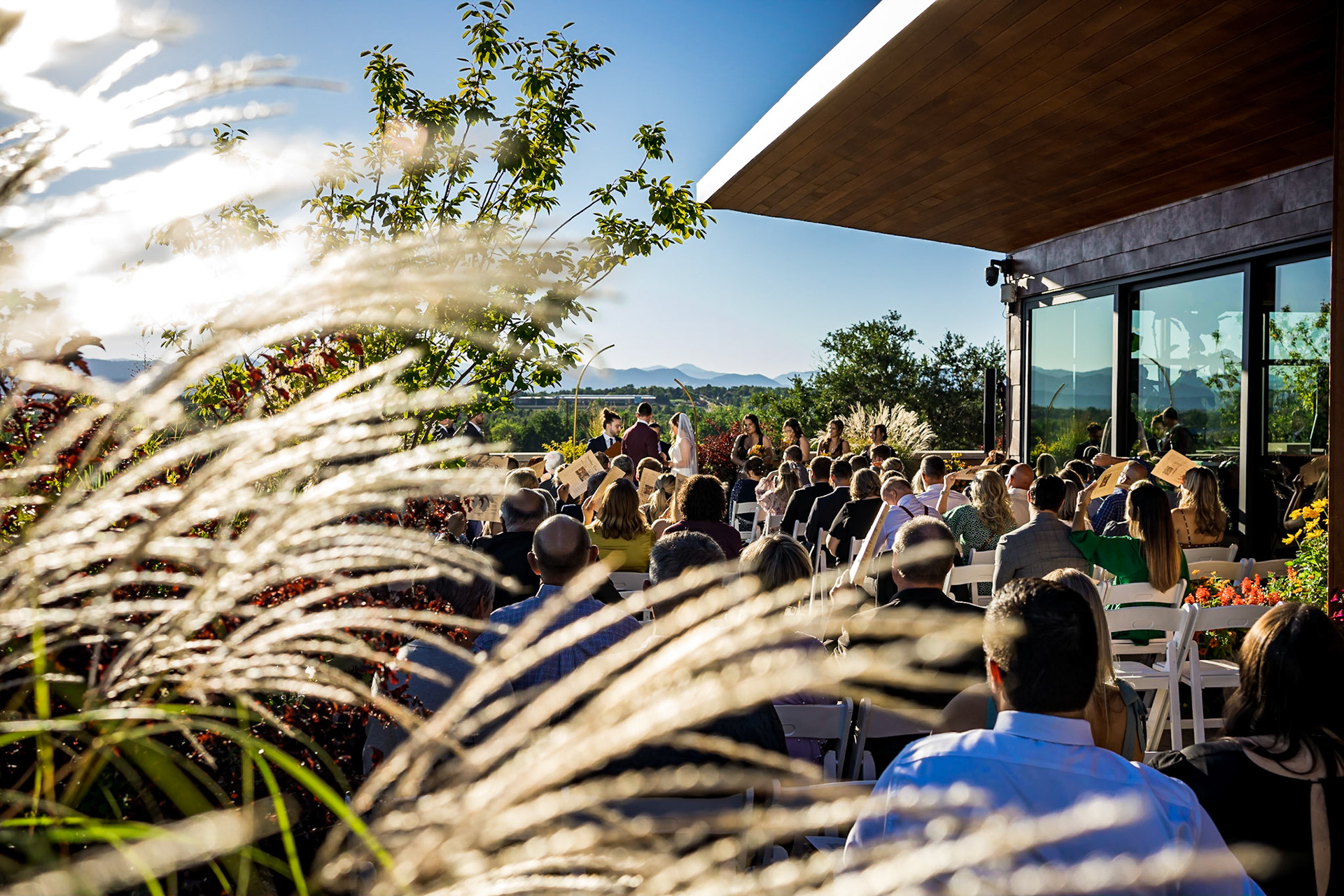 Fun, colorful, wedding at Shift Workspaces in Denver, CO with a stylish wedding party and dog ring bearer