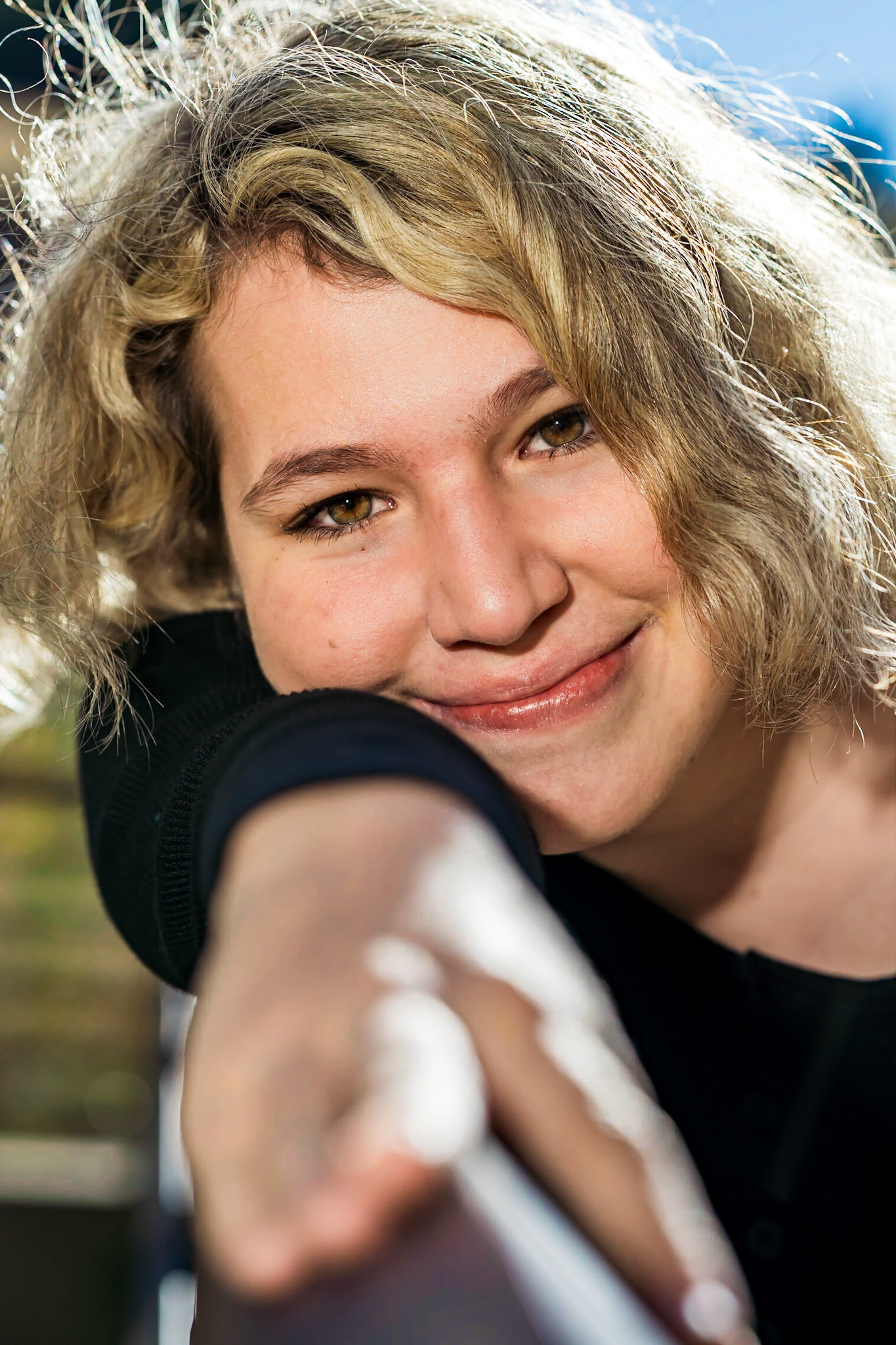 Colorful, bright, and chill high school senior portraits at Lair o The Bear Park in Morrison, CO