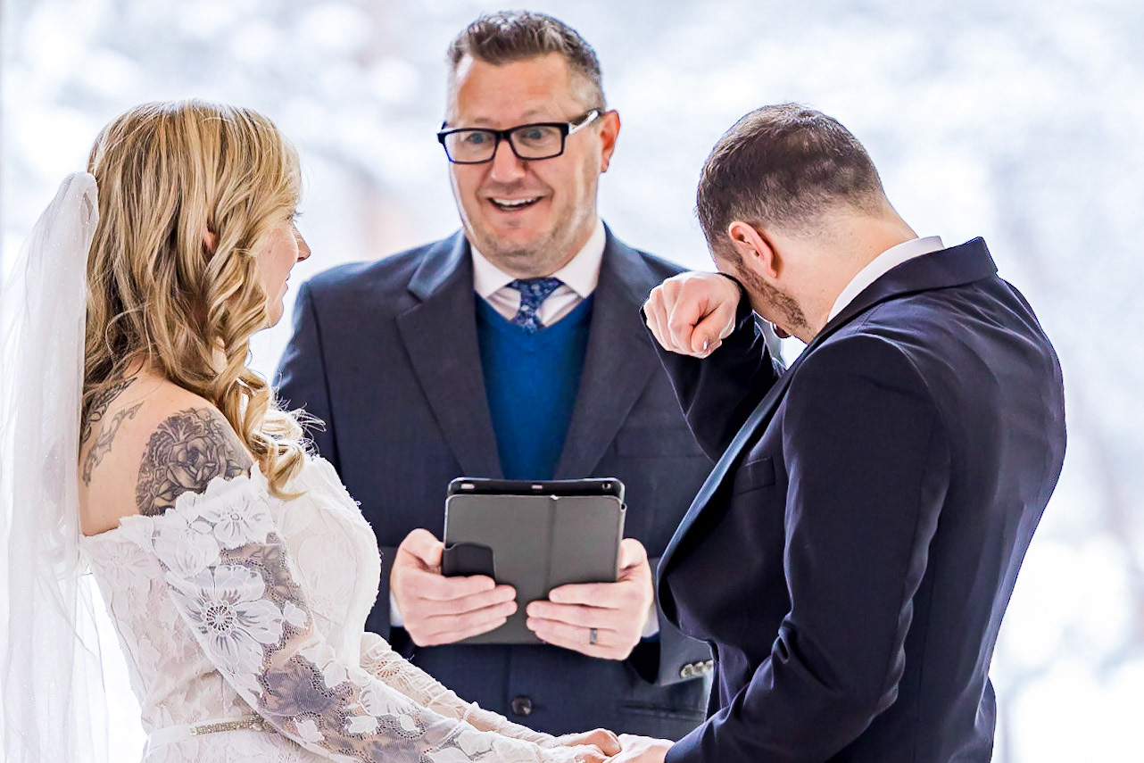 Fun, intimate winter wedding at Della Terra in Estes Park, Colorado. Reception at the Historic Park Theaters, couples portraits at The Stanley Hotel.