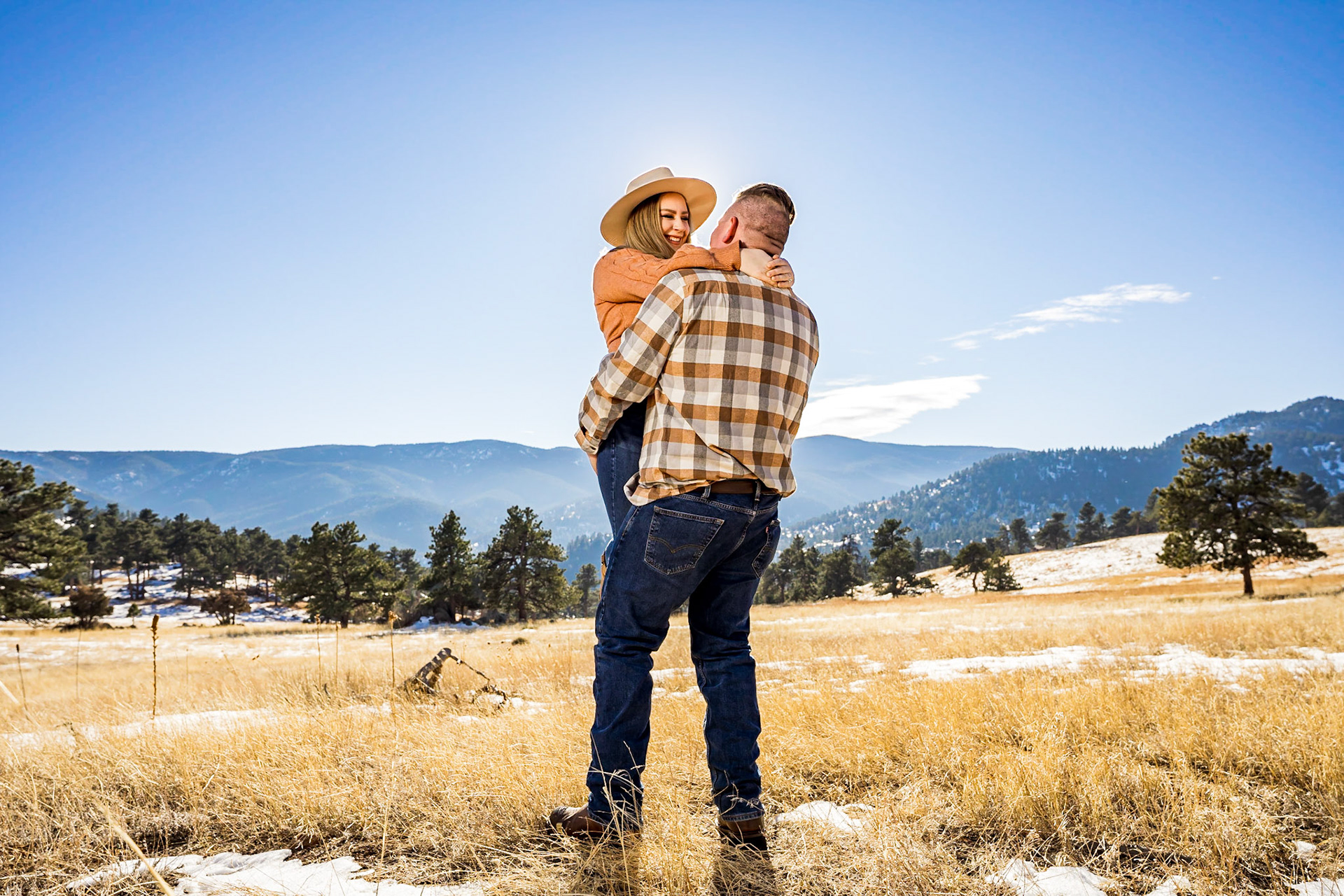 Fun, colorful winter engagement session at Betasso Preserve in Boulder Colorado.