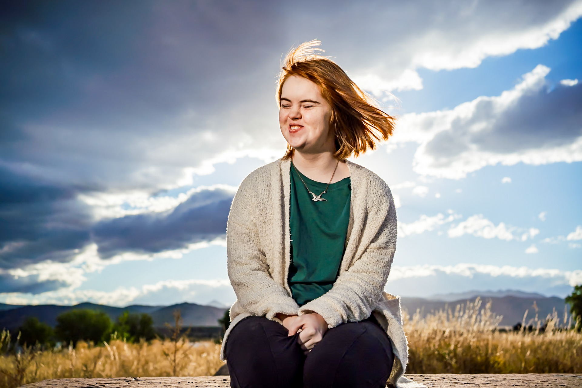 Senior portraits for a young woman wiht Down's Syndrome in Boulder, CO