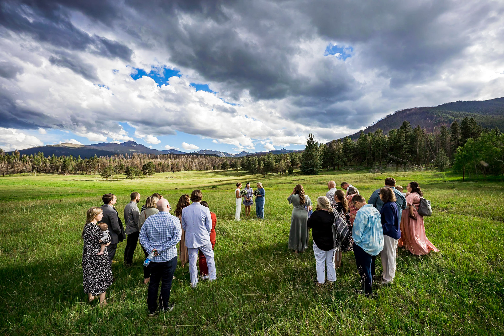 Fun, colorful, LGBTQ+ elopement, intimate wedding ceremony in Rocky Mountain National Park in Colorado